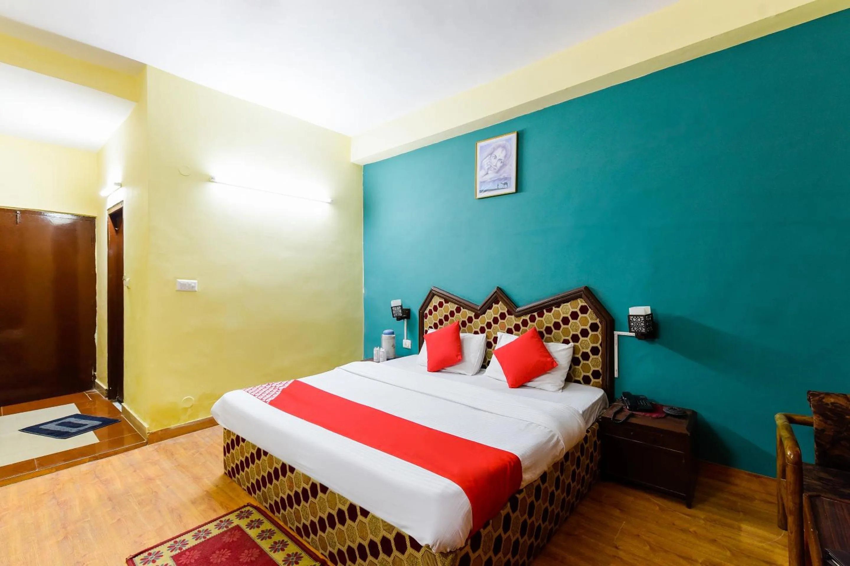 Bed in Hotel Sitara International