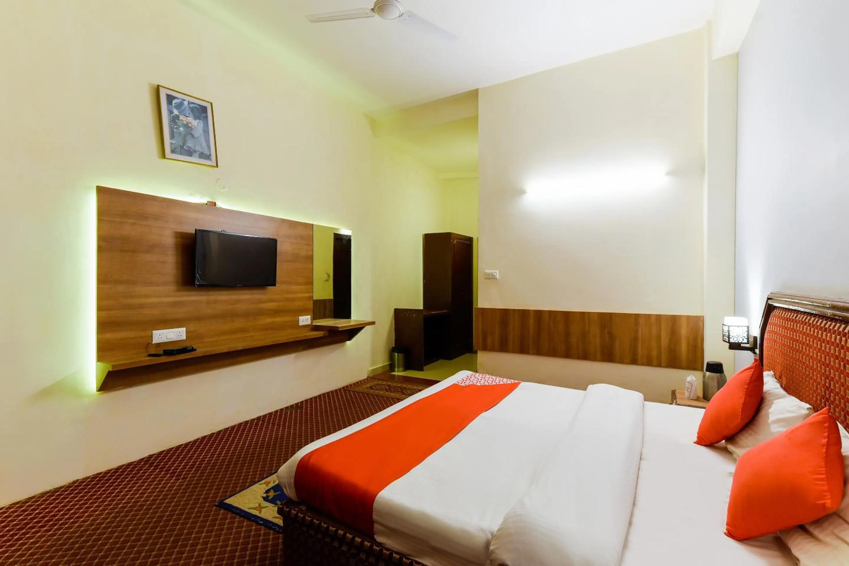 Bed in Hotel Sitara International