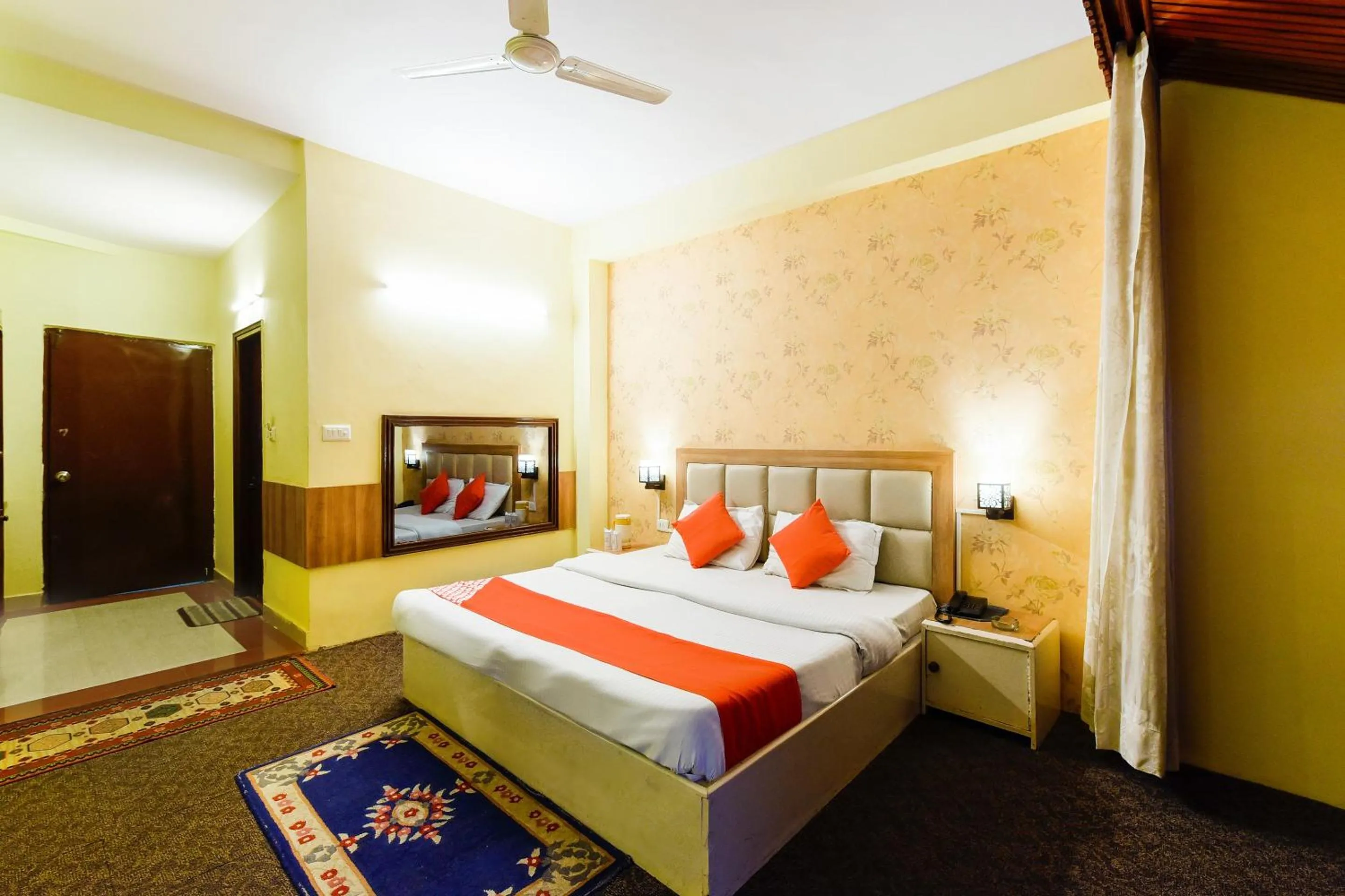 Bed in Hotel Sitara International