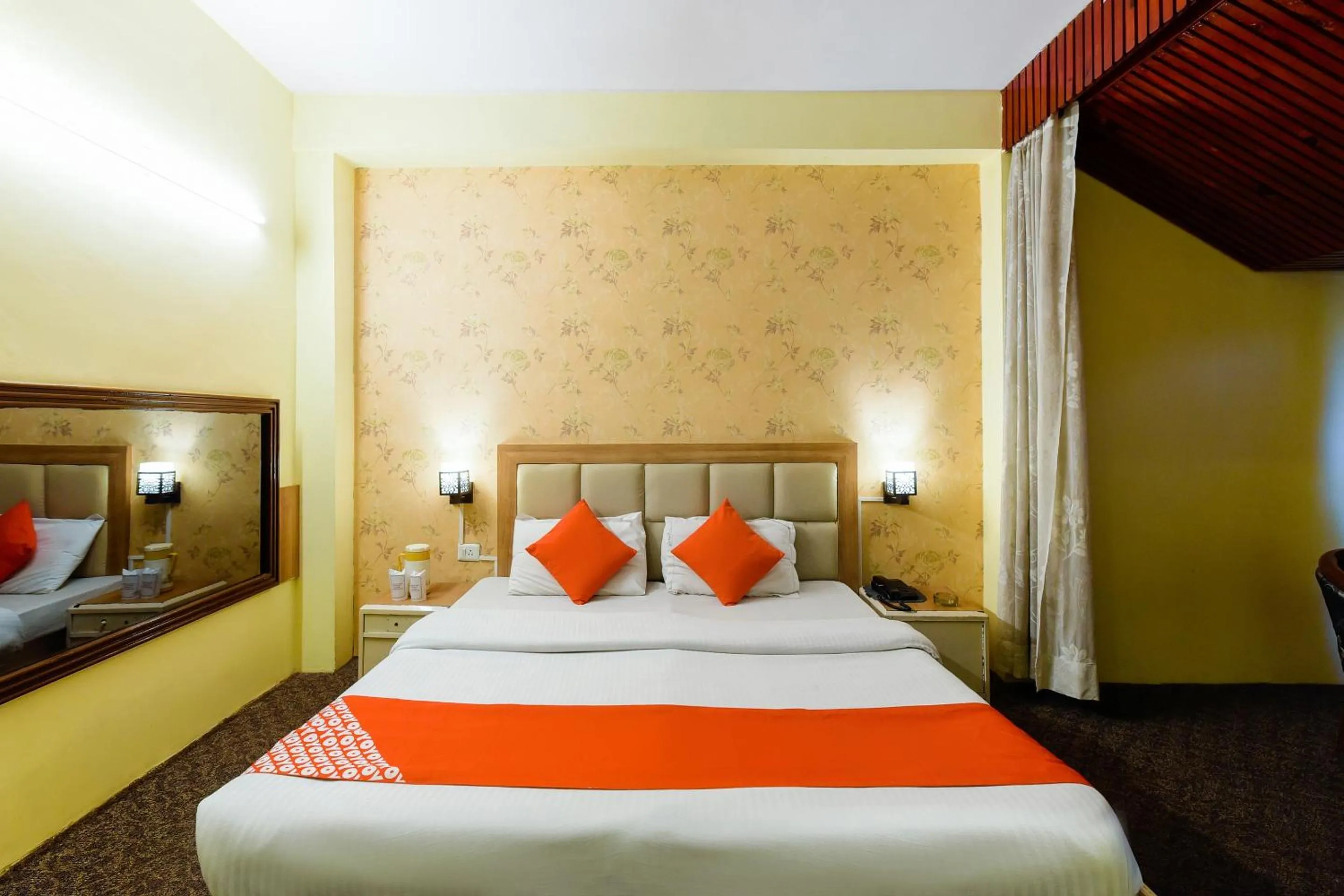 Bed in Hotel Sitara International