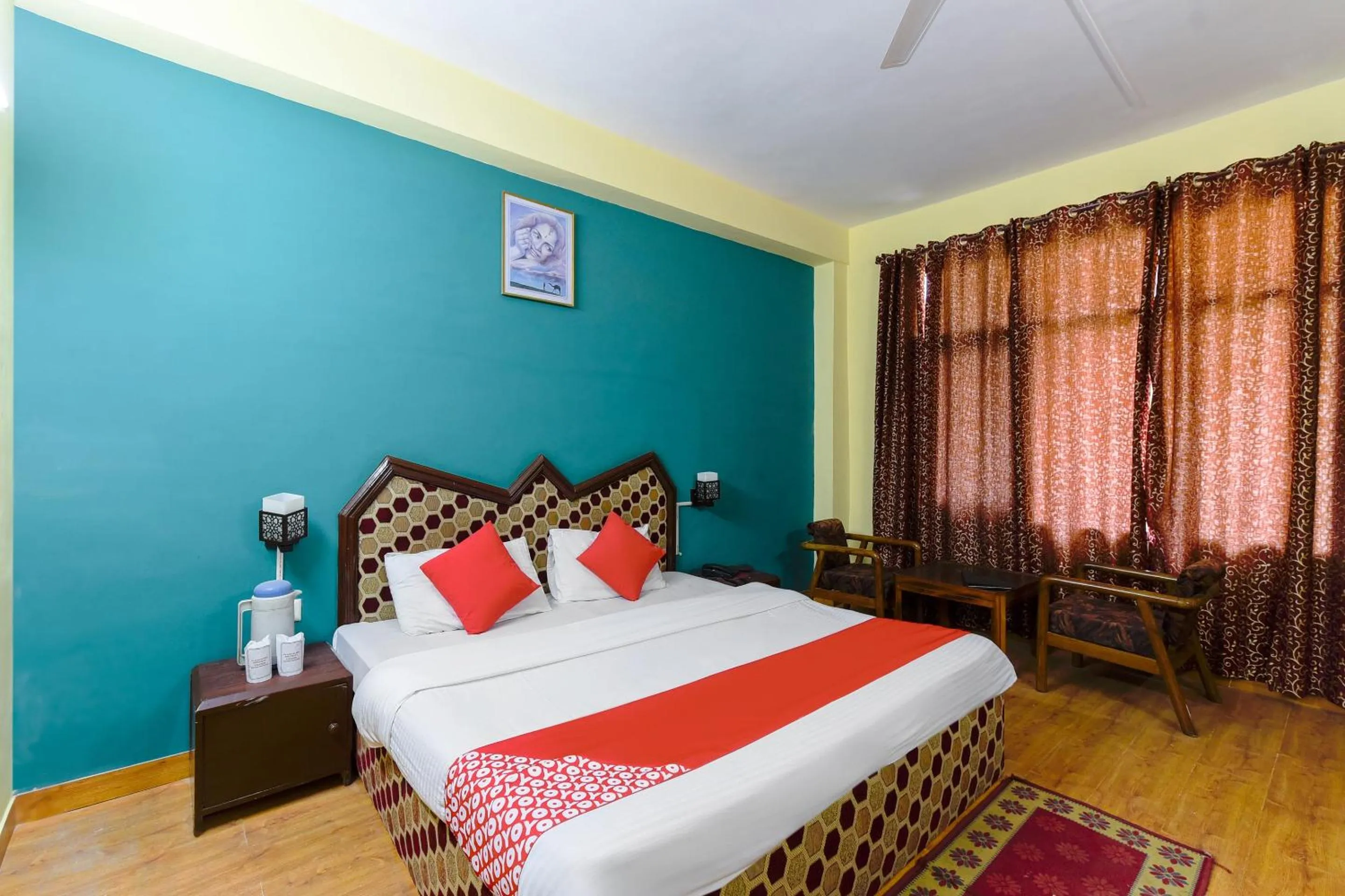 Bed in Hotel Sitara International