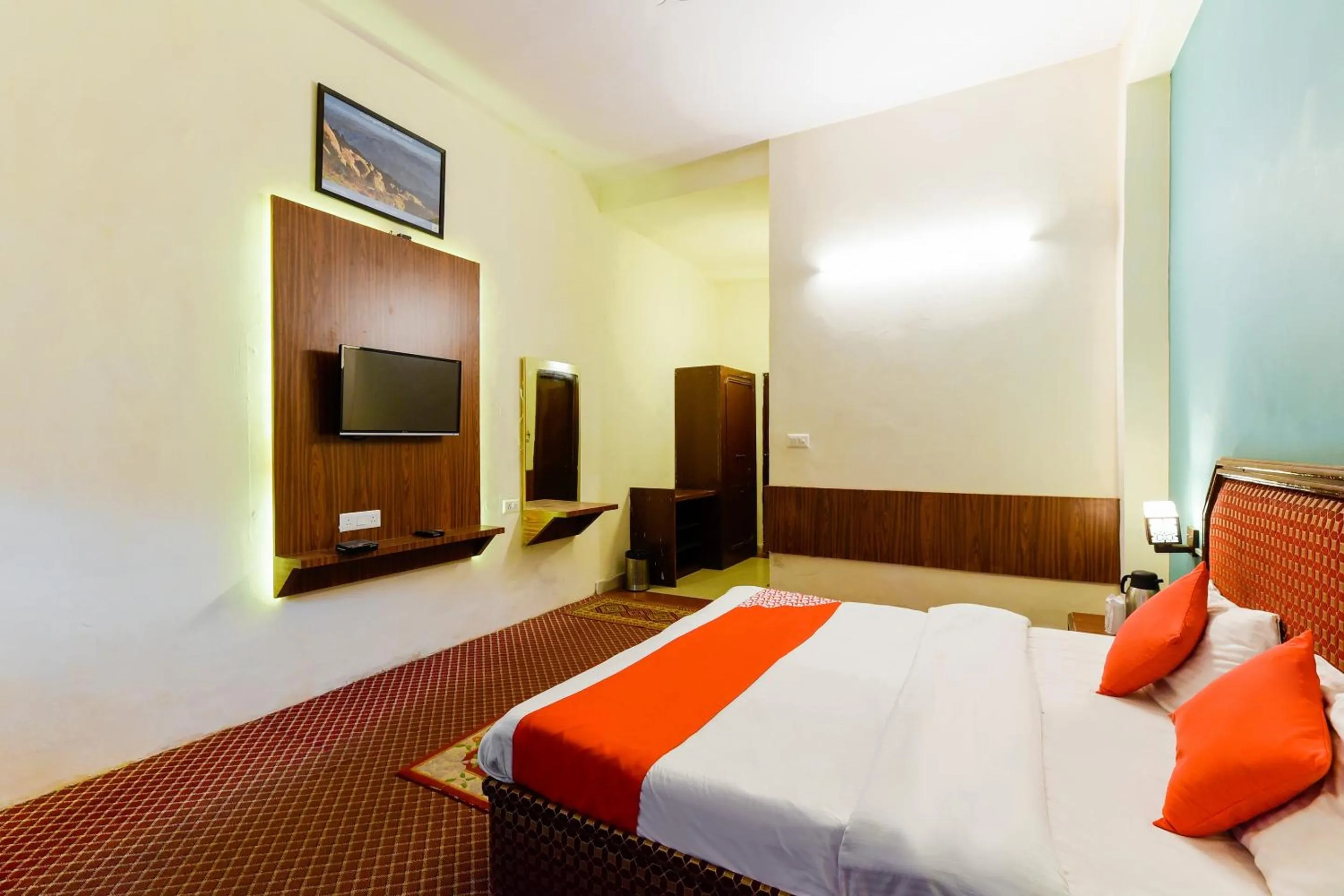Bed in Hotel Sitara International