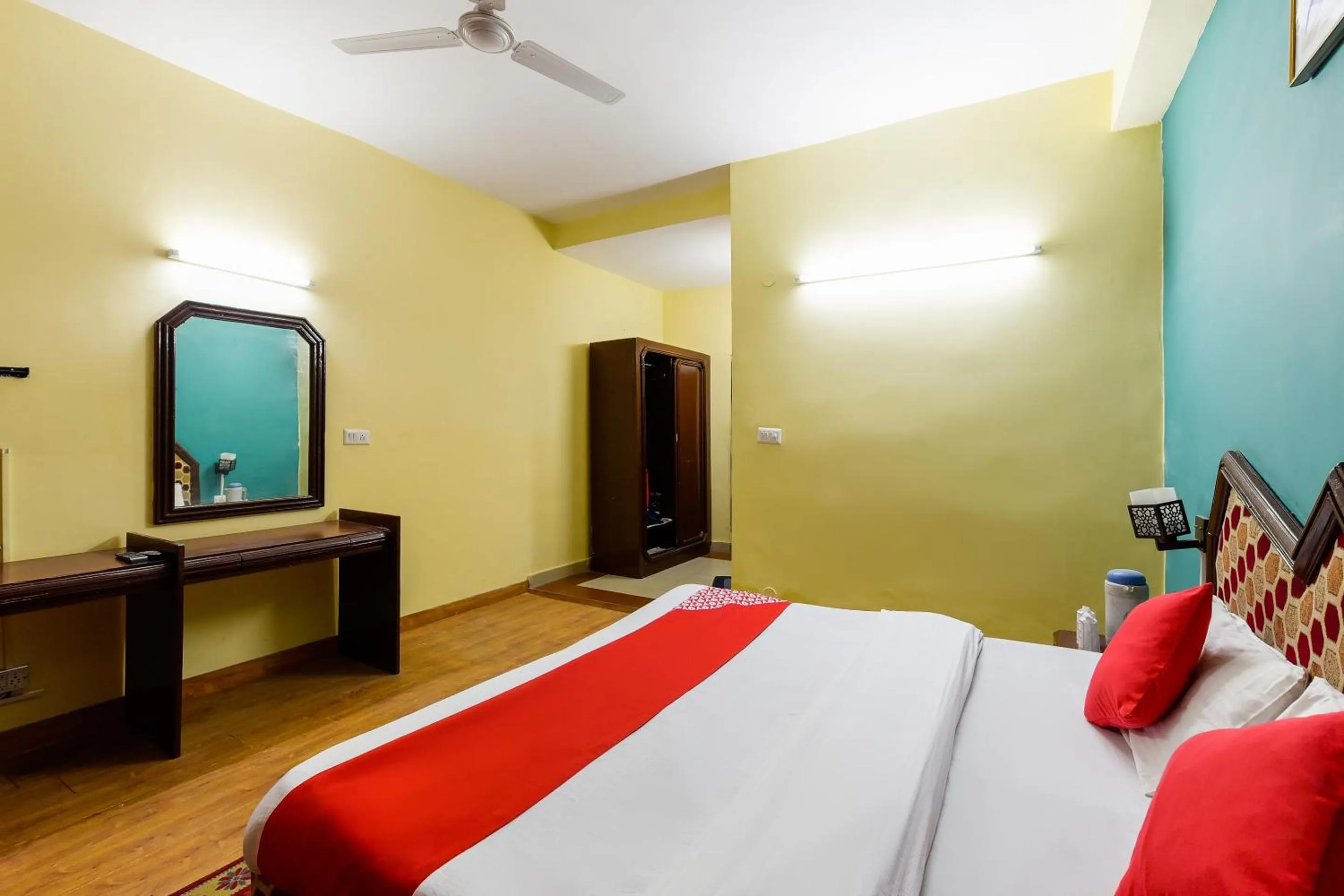Bed in Hotel Sitara International