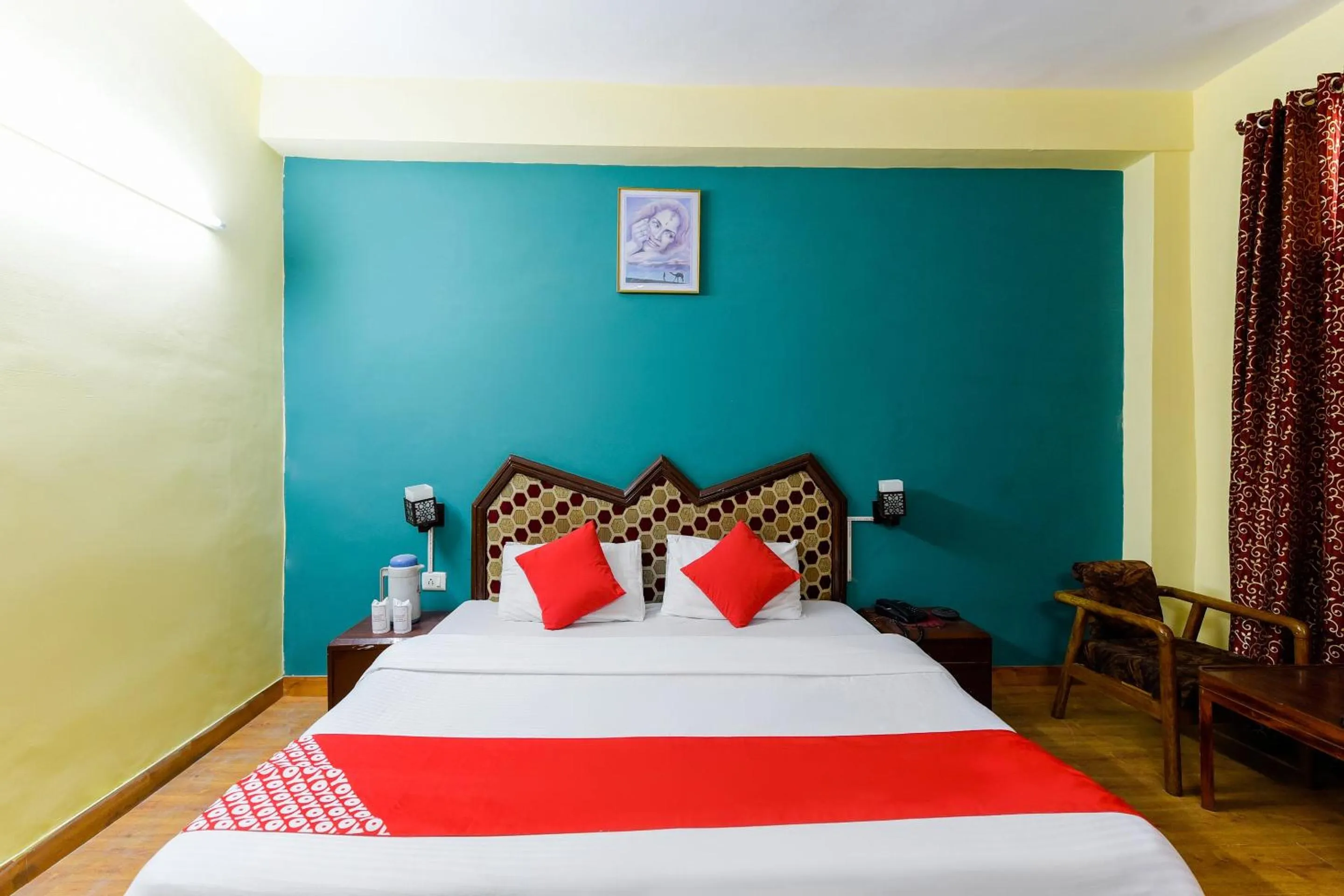 Bed in Hotel Sitara International