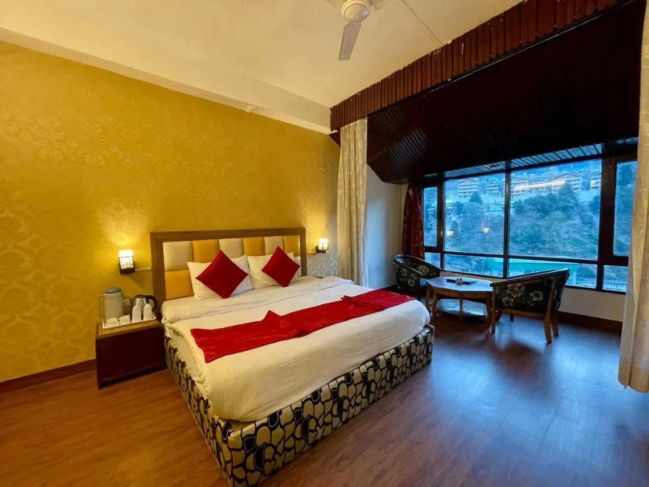 Bed in Hotel Sitara International