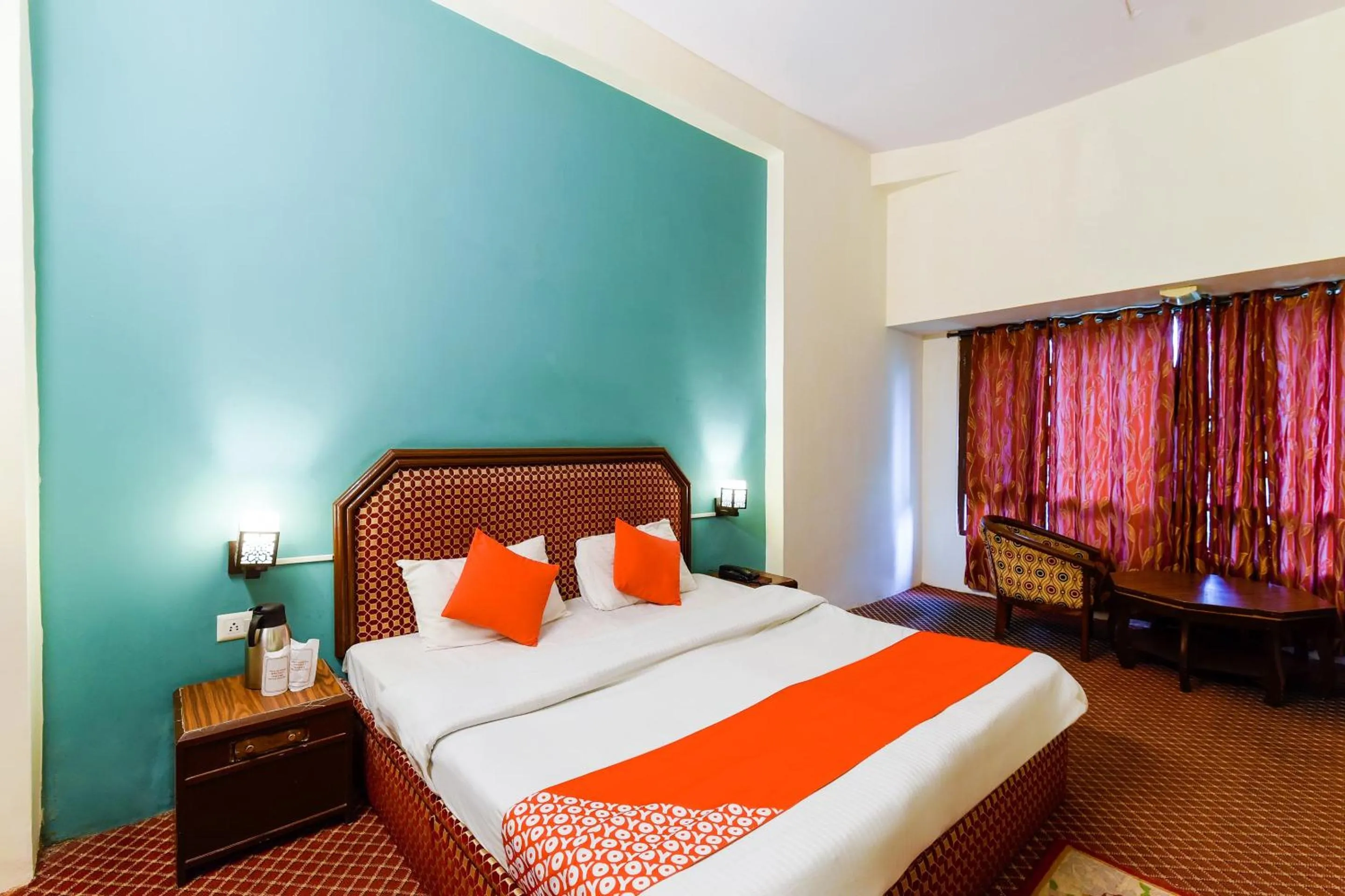 Bed in Hotel Sitara International