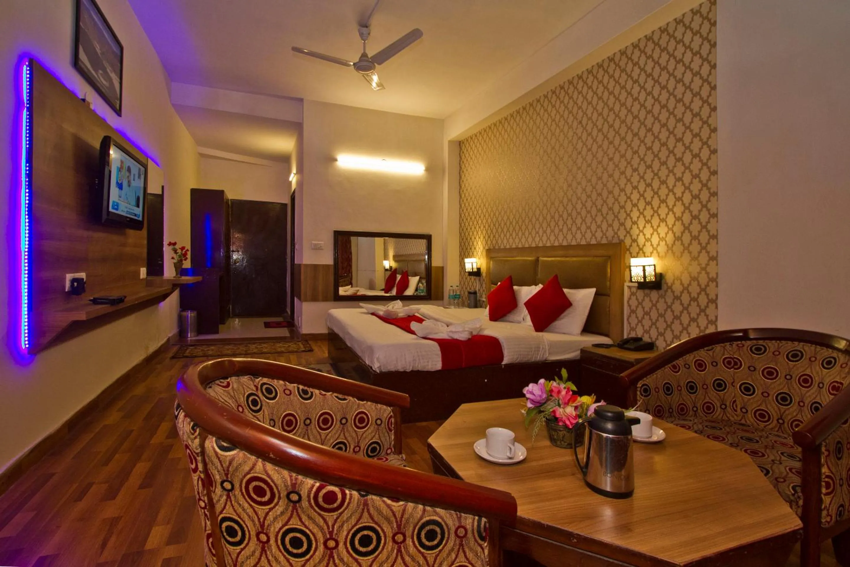 Bed in Hotel Sitara International