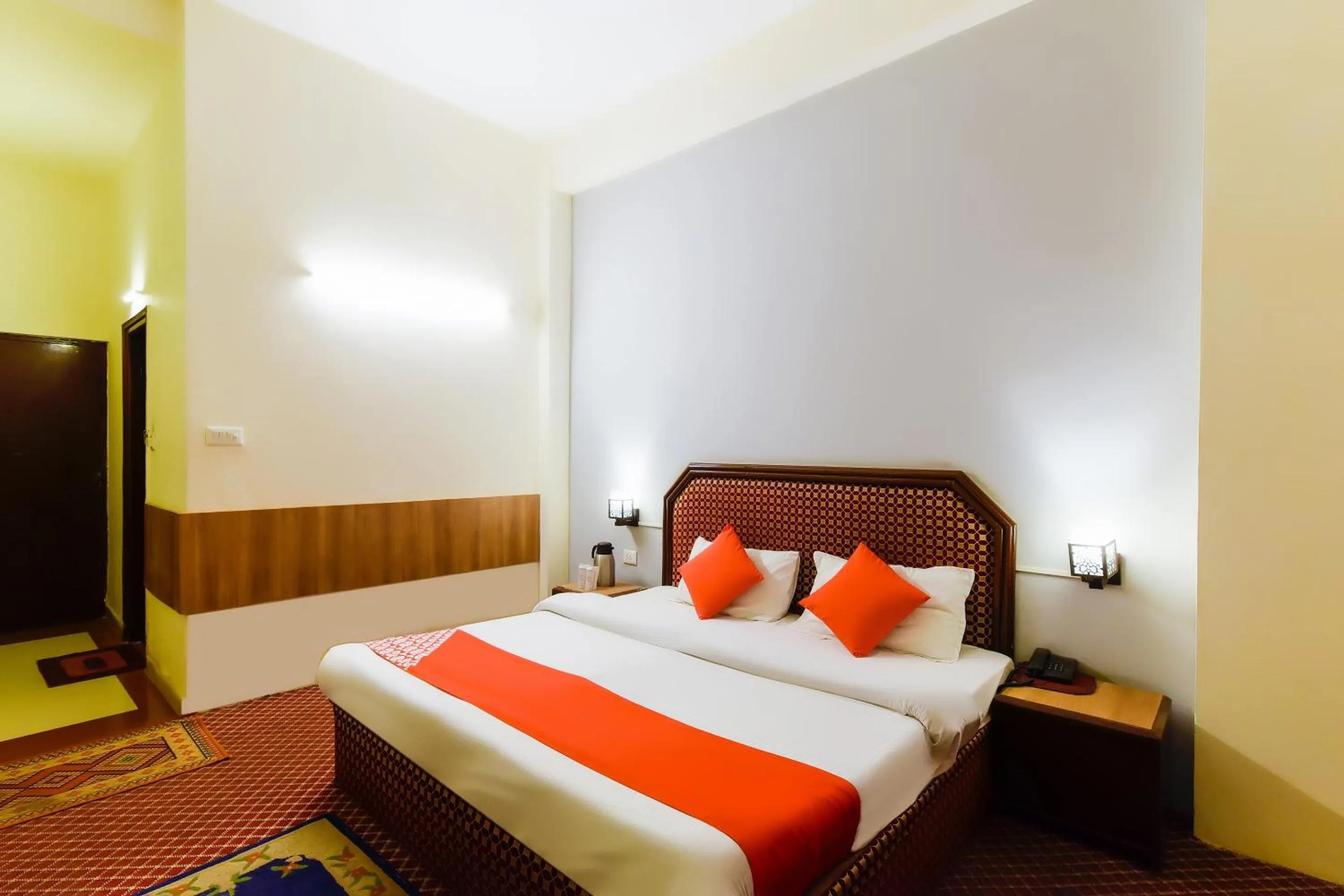Bed in Hotel Sitara International