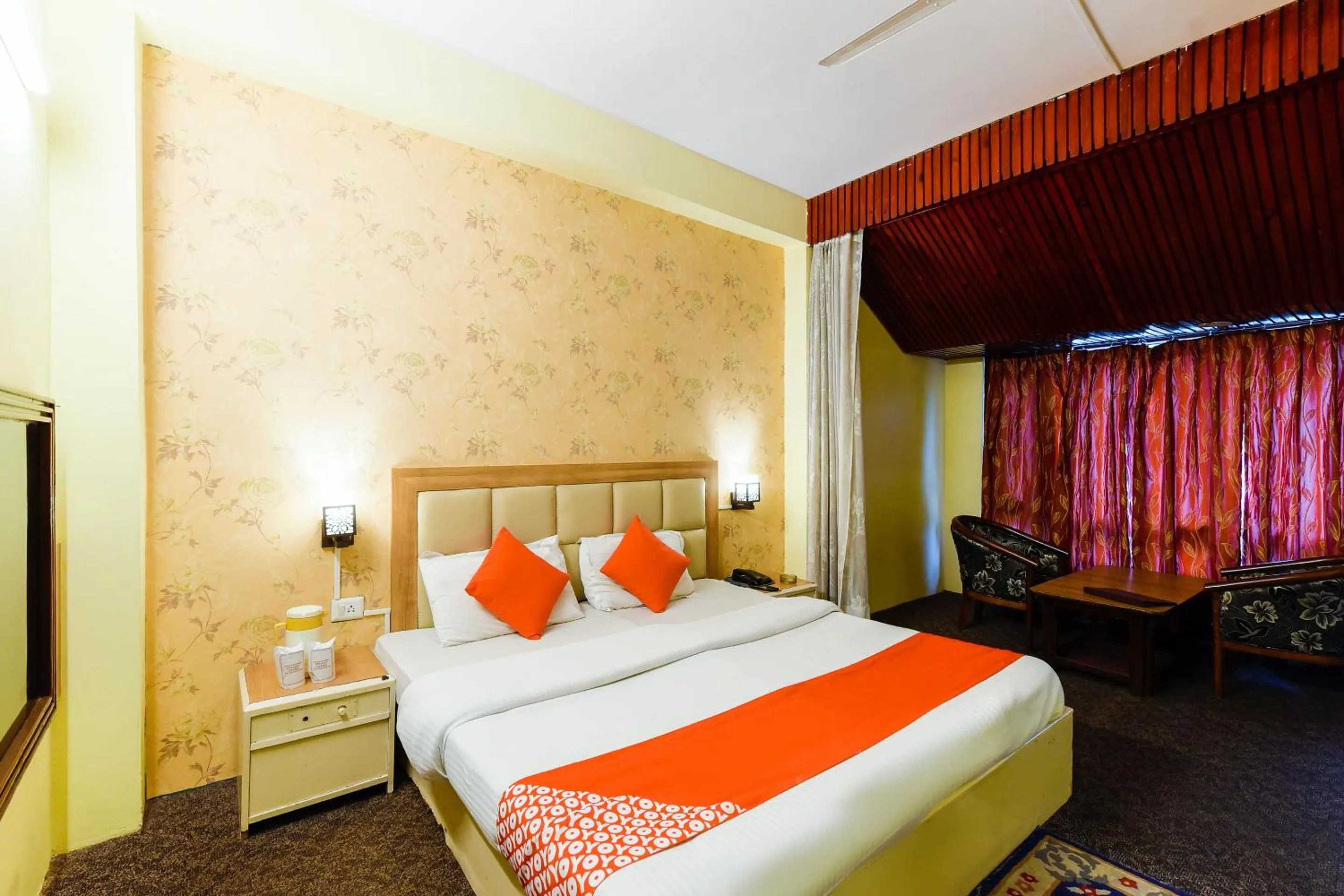 Bed in Hotel Sitara International