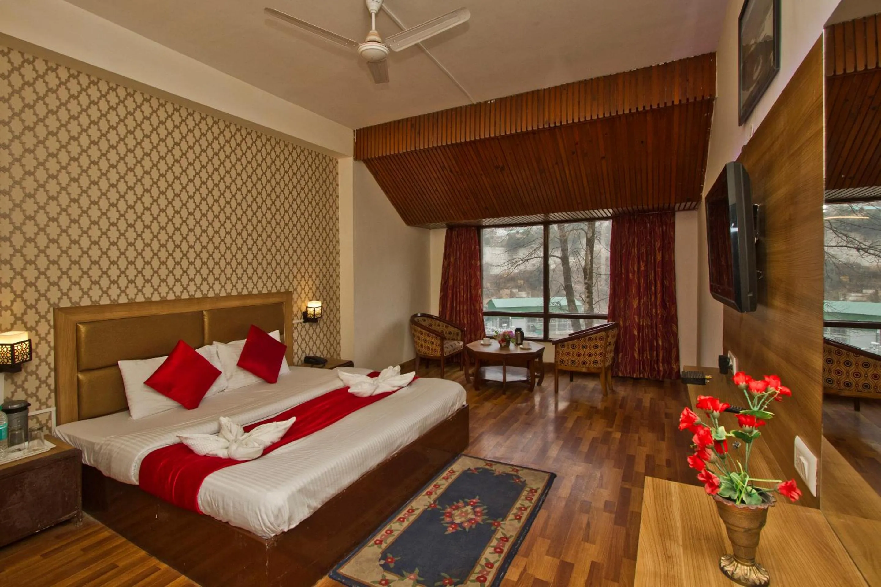 Bed in Hotel Sitara International