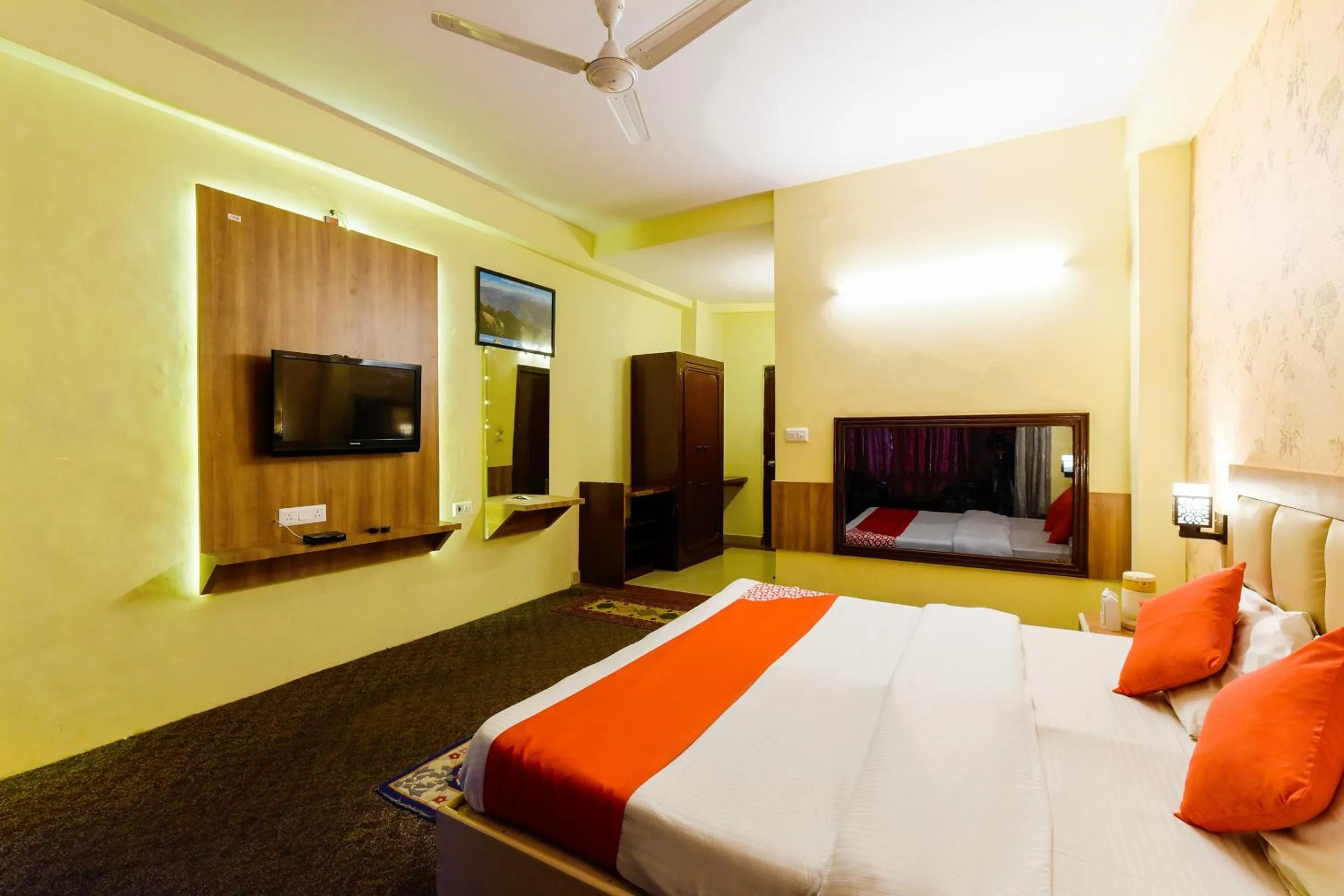 Bed in Hotel Sitara International