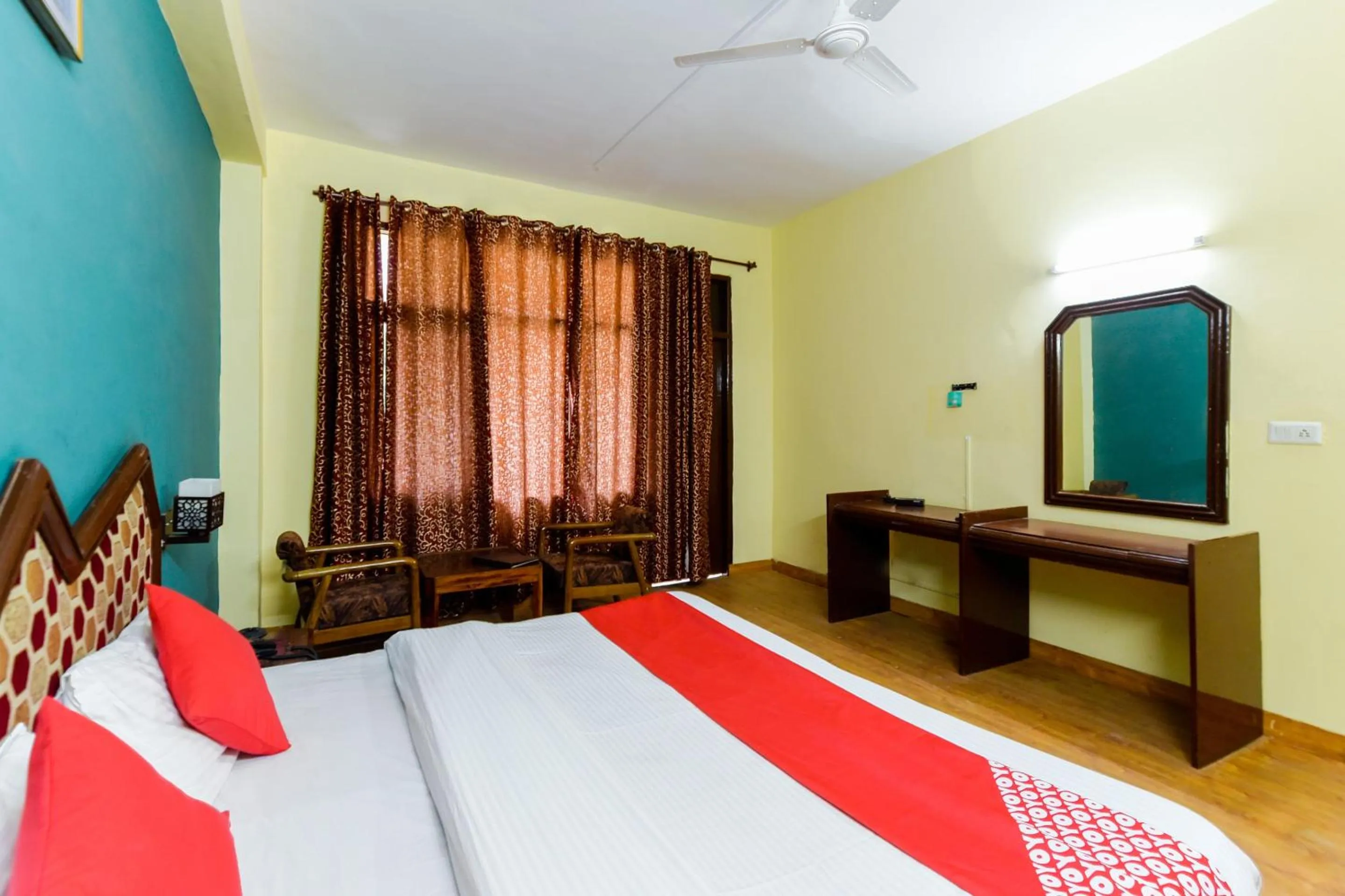 Bed in Hotel Sitara International