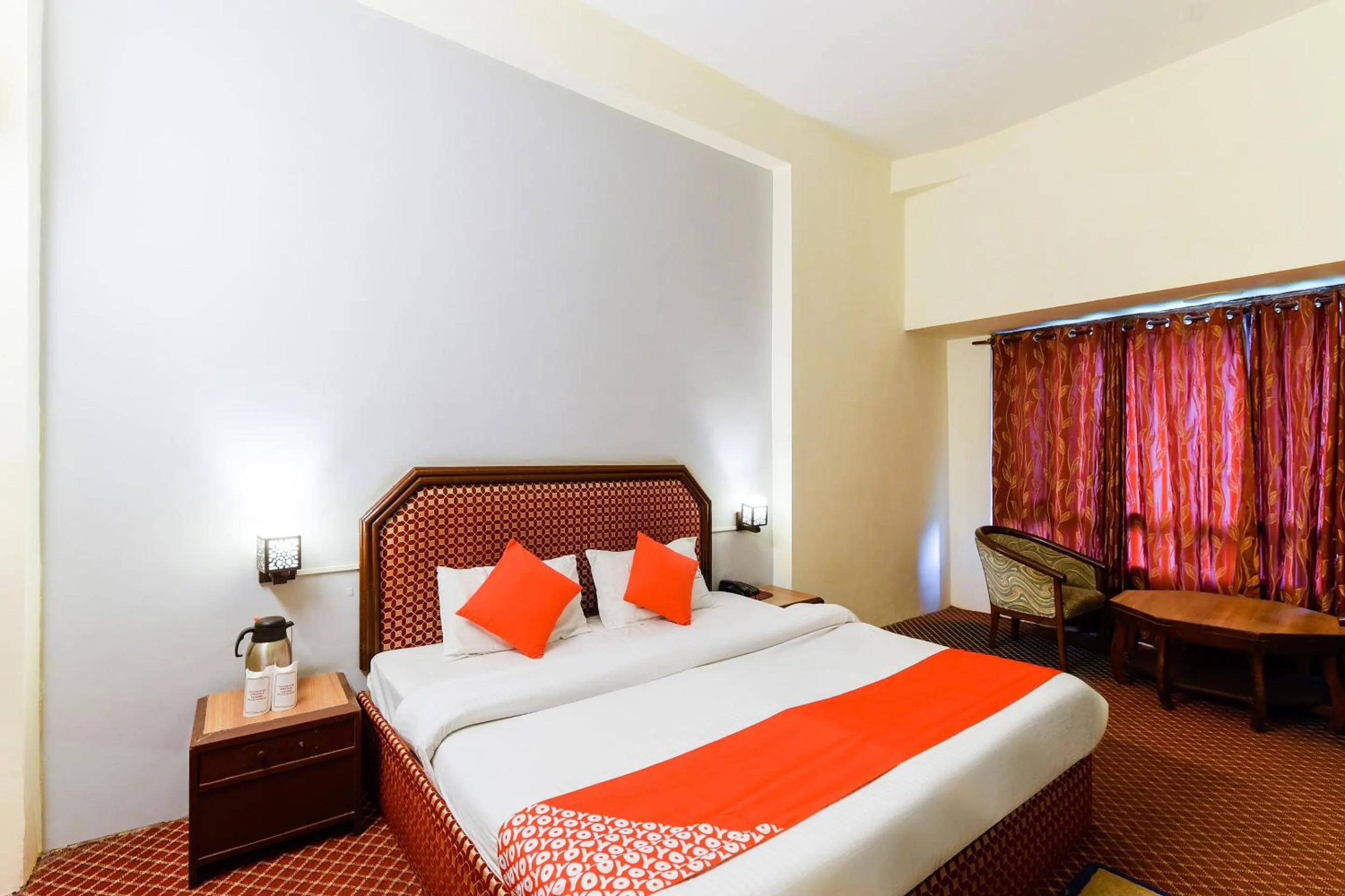 Bed in Hotel Sitara International