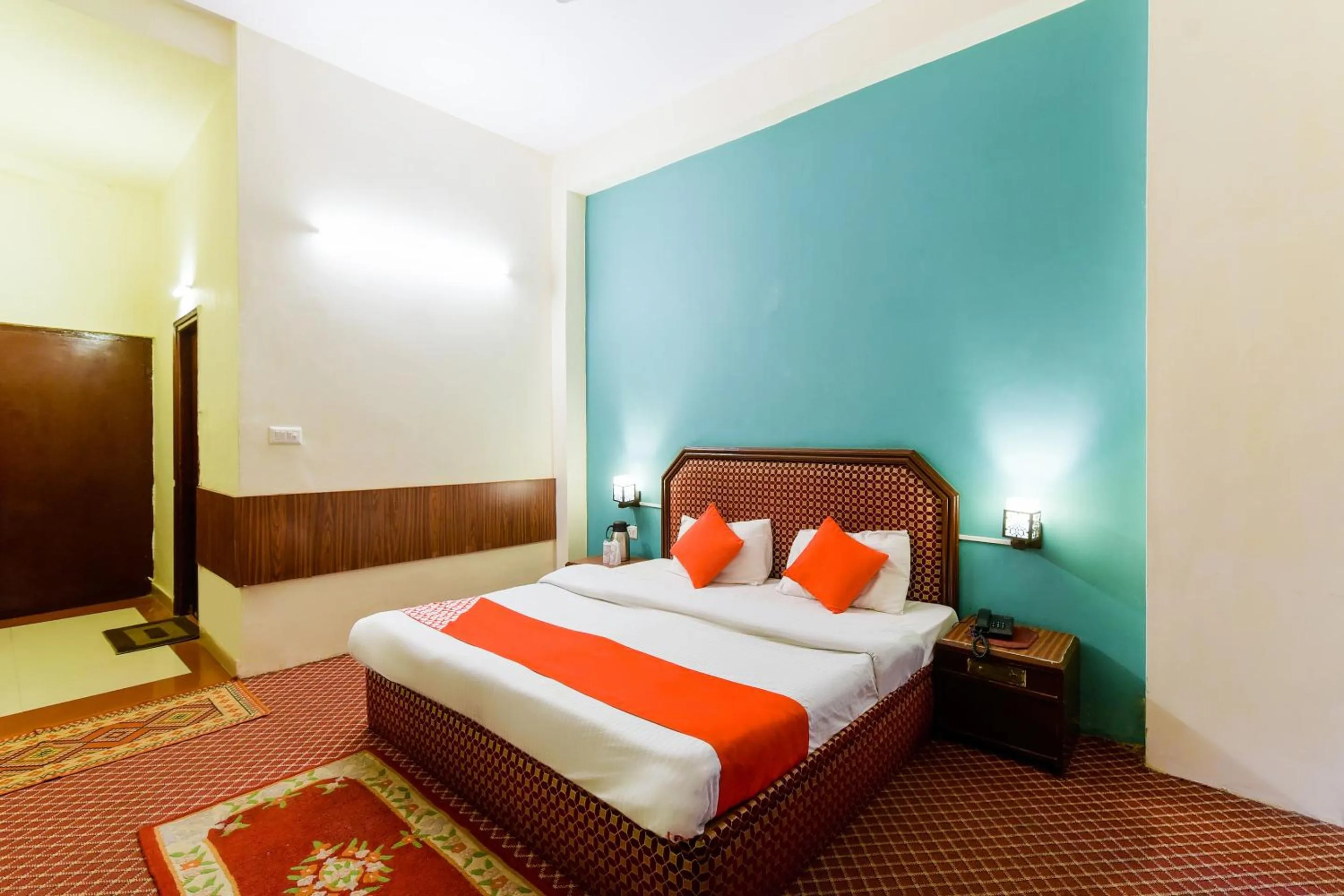 Bed in Hotel Sitara International