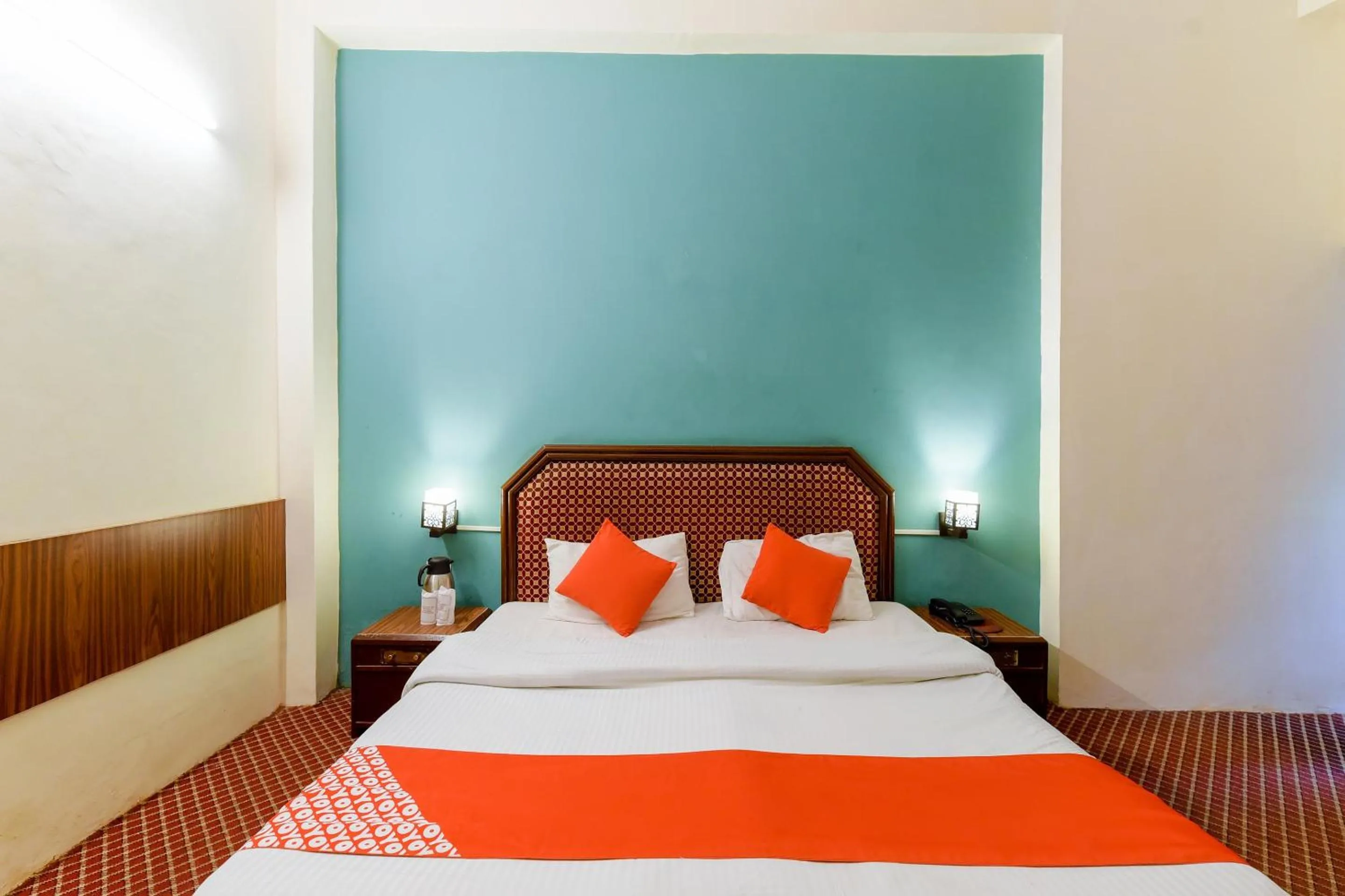 Bed in Hotel Sitara International