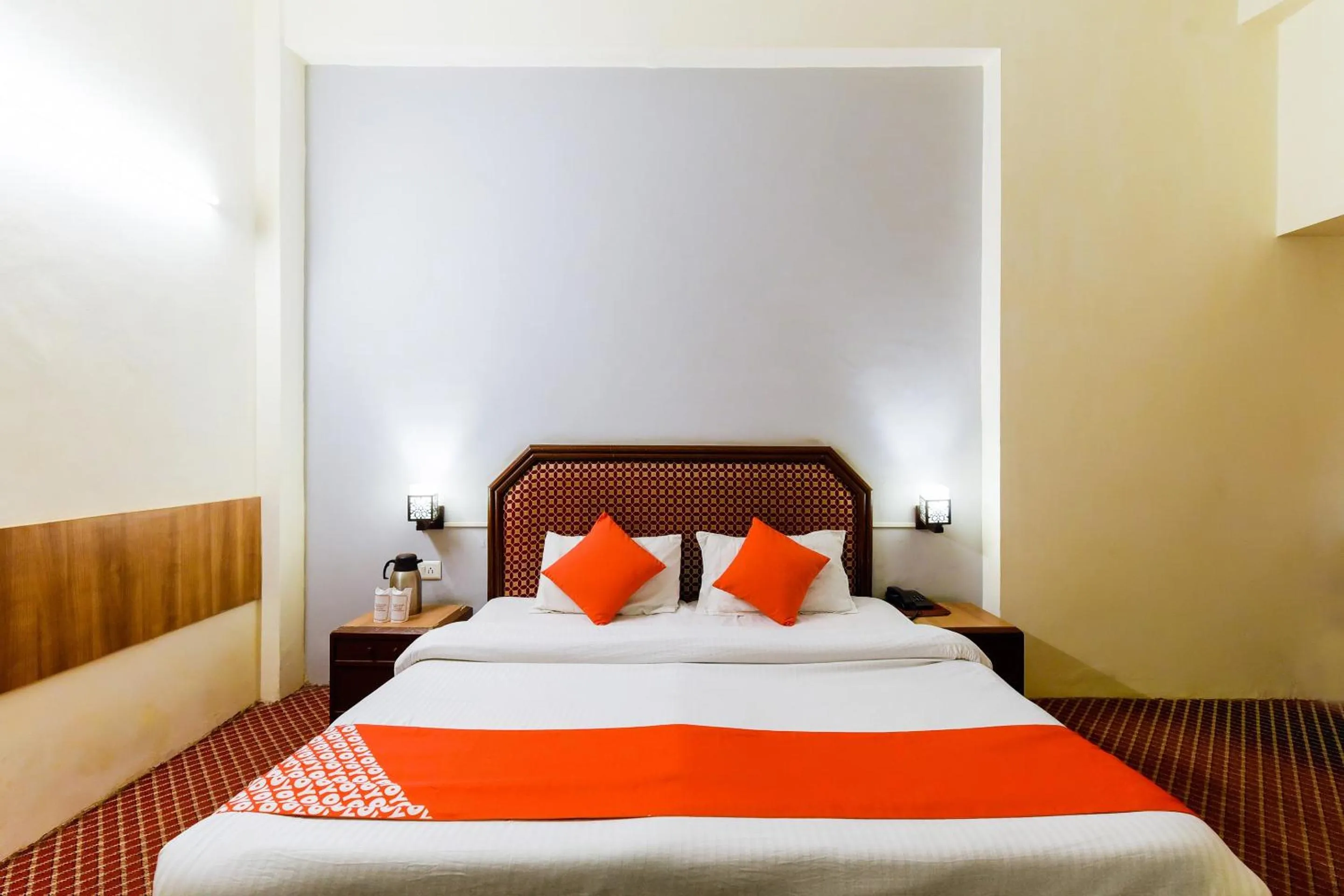 Bed in Hotel Sitara International