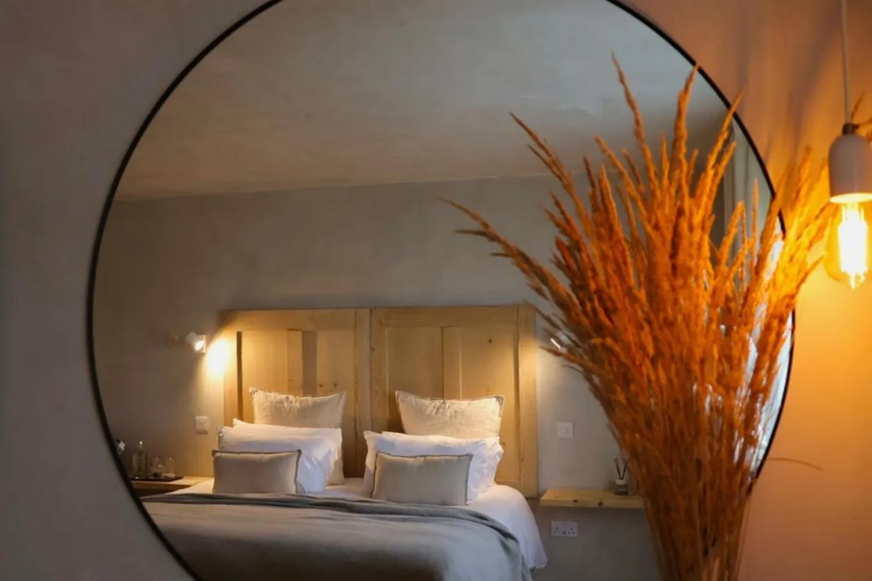 Bed in Fiddle + Bow Hotel