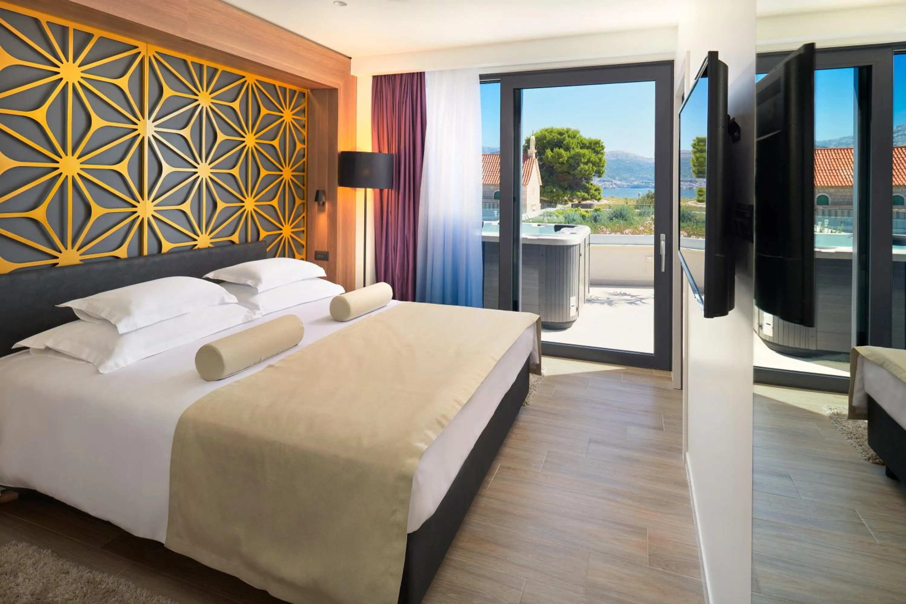 Bed in Amphora Hotel