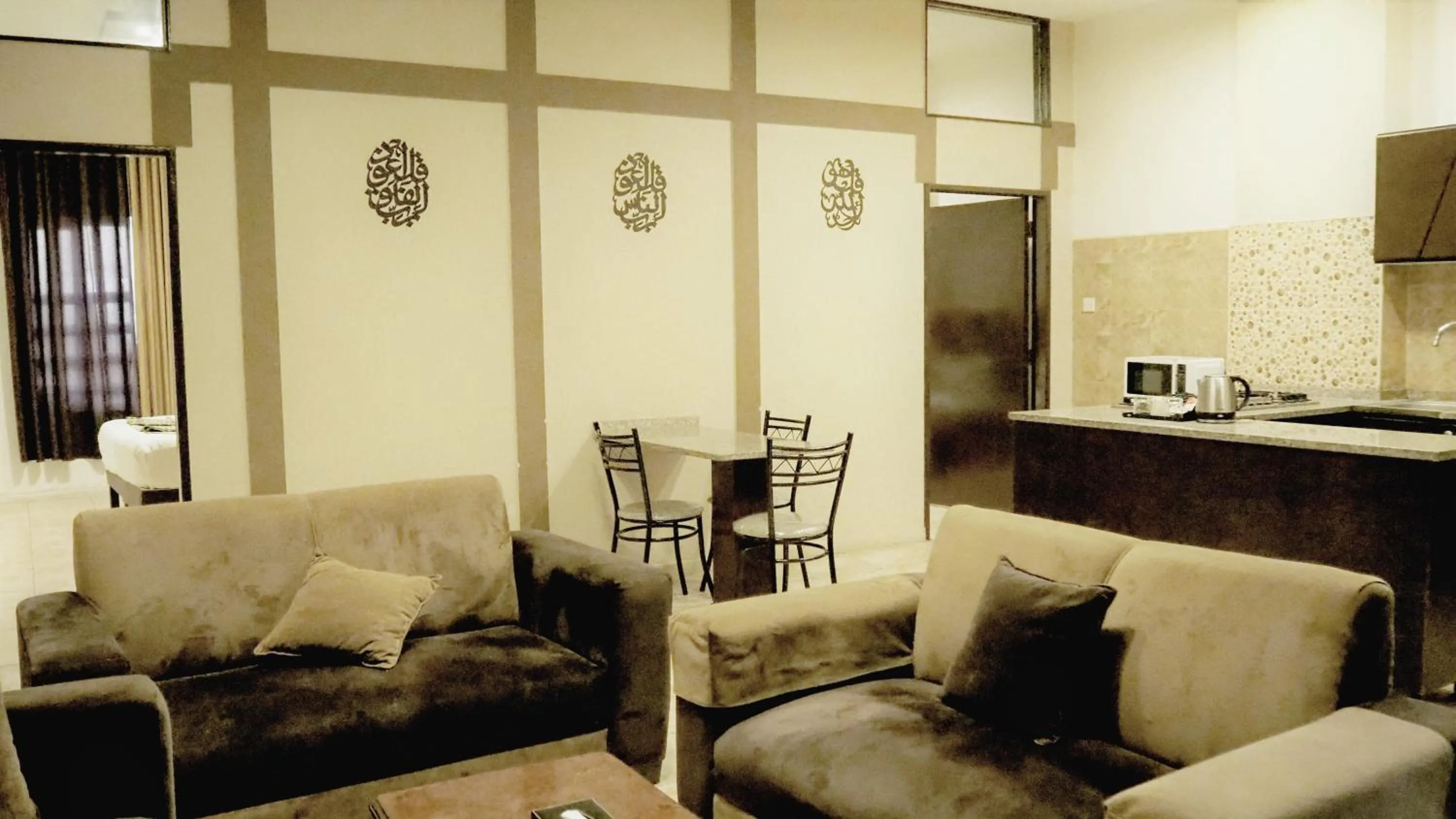 Kitchen or kitchenette in Al Fawanes Hotel Apartments