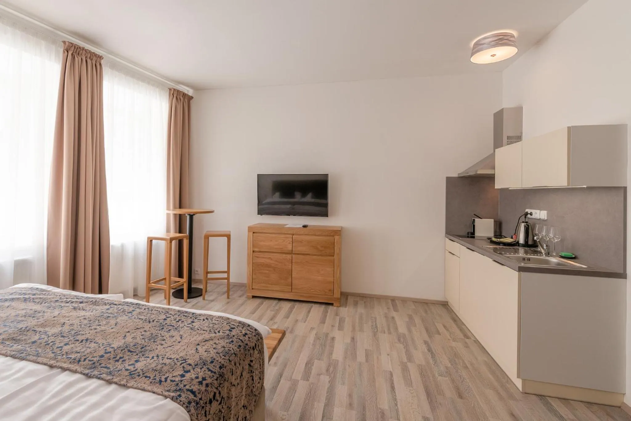 Kitchen or kitchenette, Bed in Historic Centre Aparthotel X