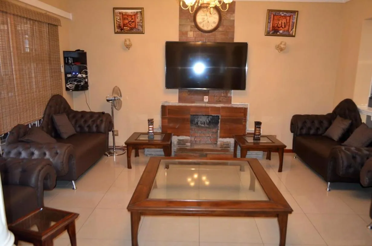 Communal lounge/ TV room in ST@Y-1-BnB