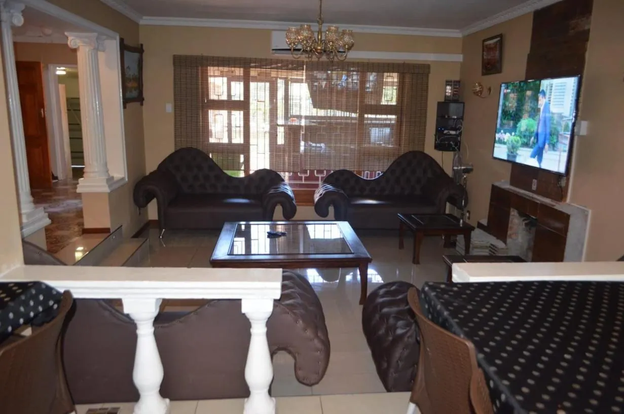 Communal lounge/ TV room in ST@Y-1-BnB