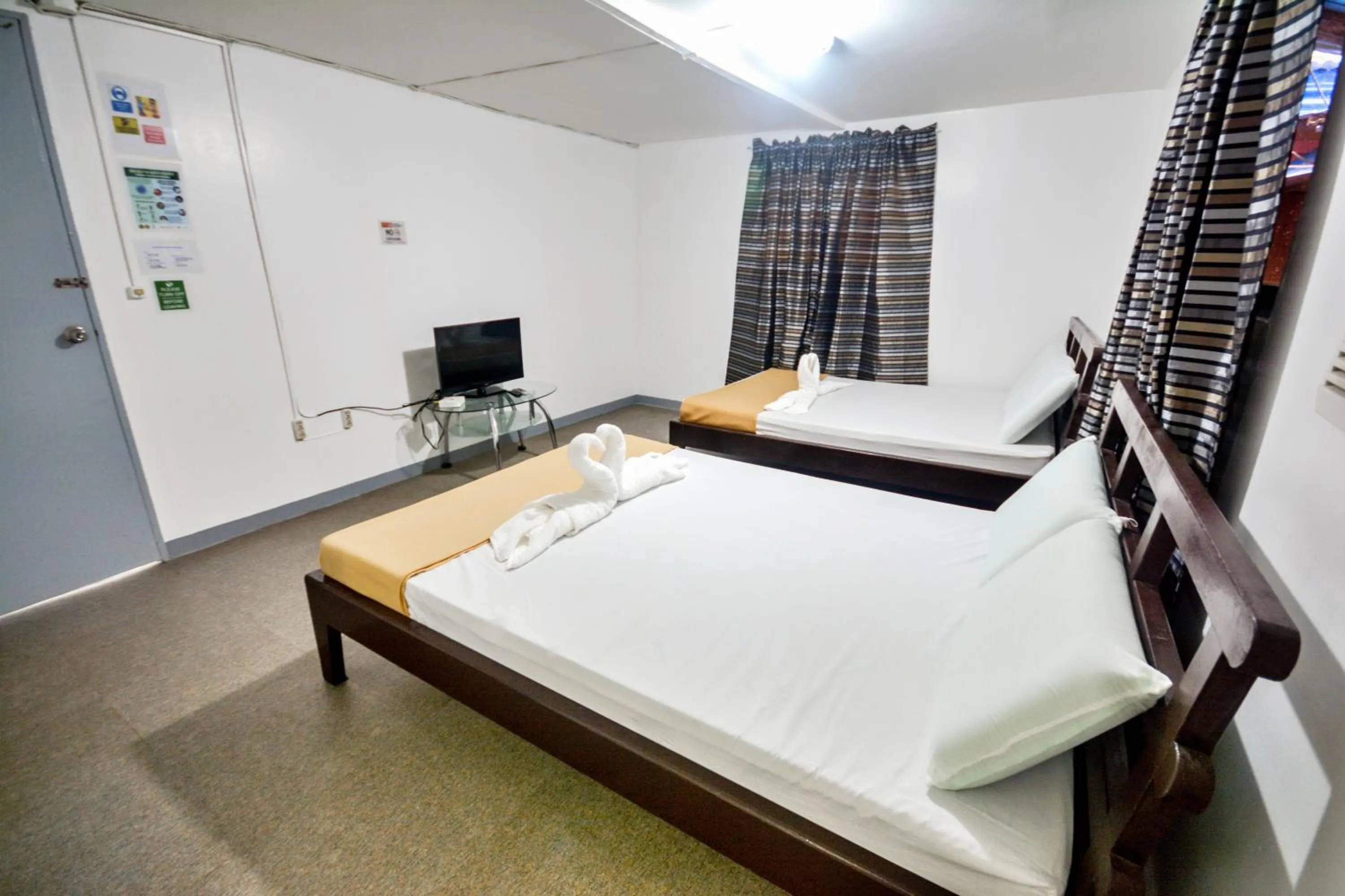 Photo of the whole room, Bed in Boracay Morning Beach Resort