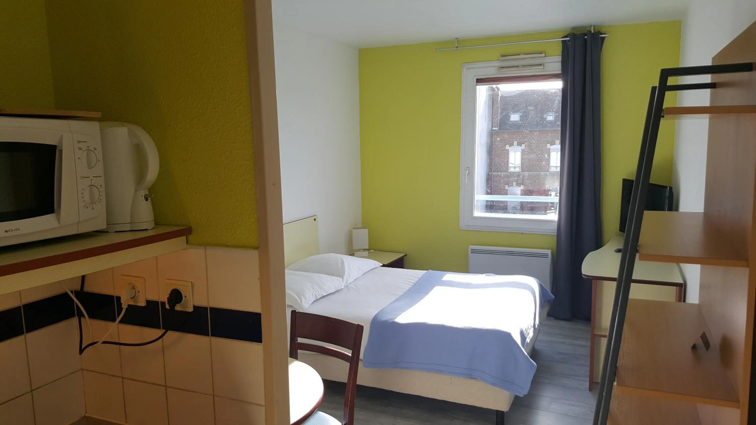 Bed in Résidence Hôtelière Poincaré