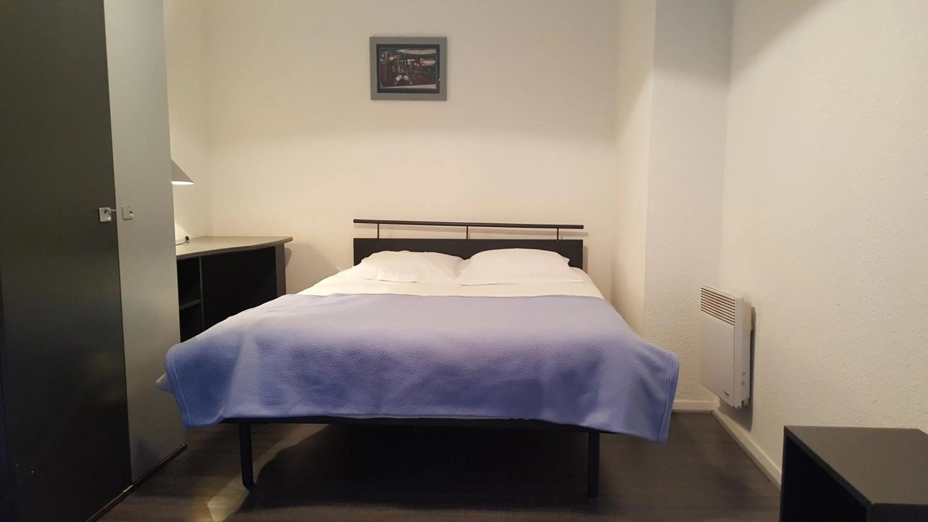 Bed in Résidence Hôtelière Poincaré