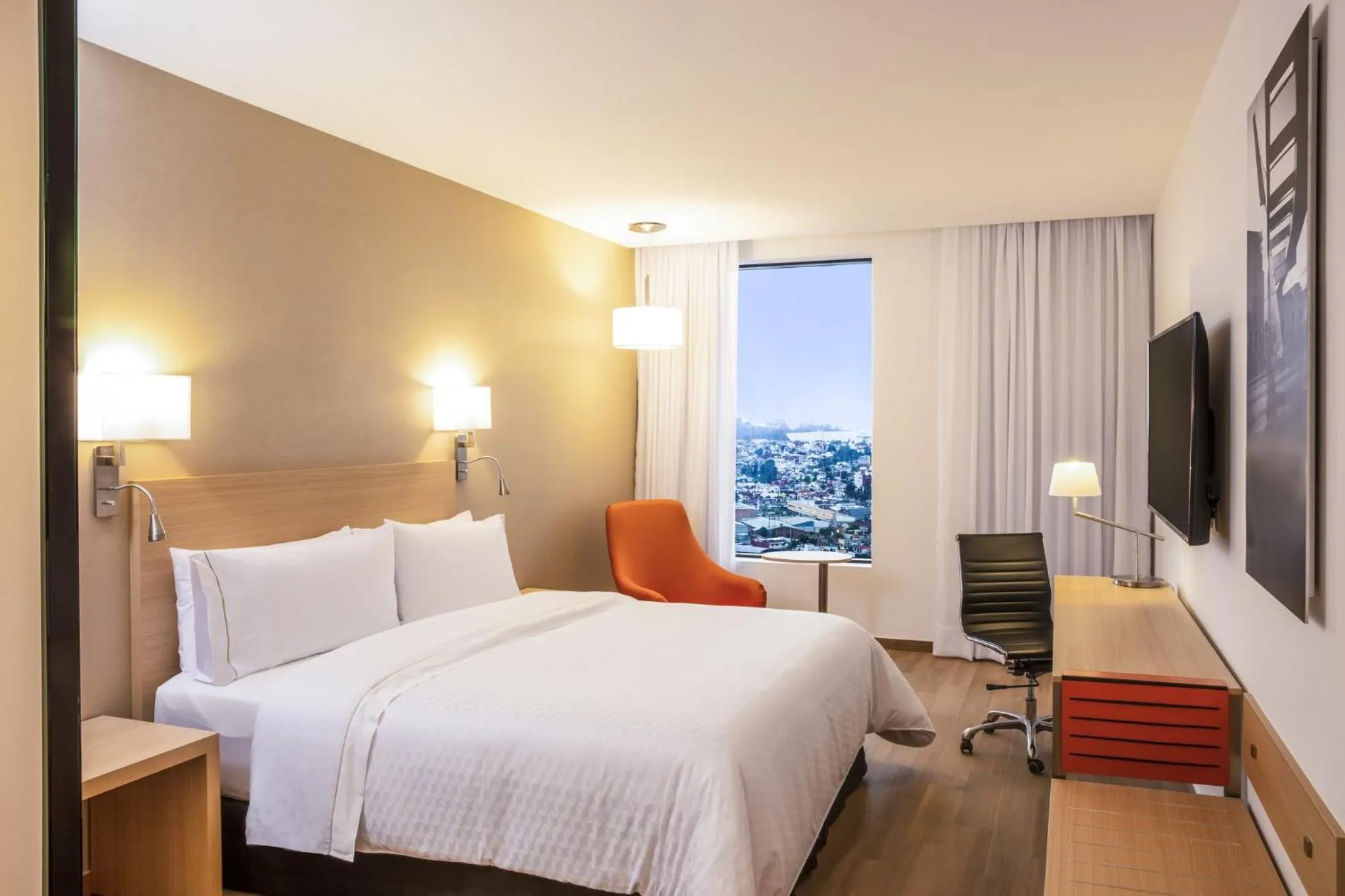 Photo of the whole room, Bed in Fiesta Inn Parque Puebla