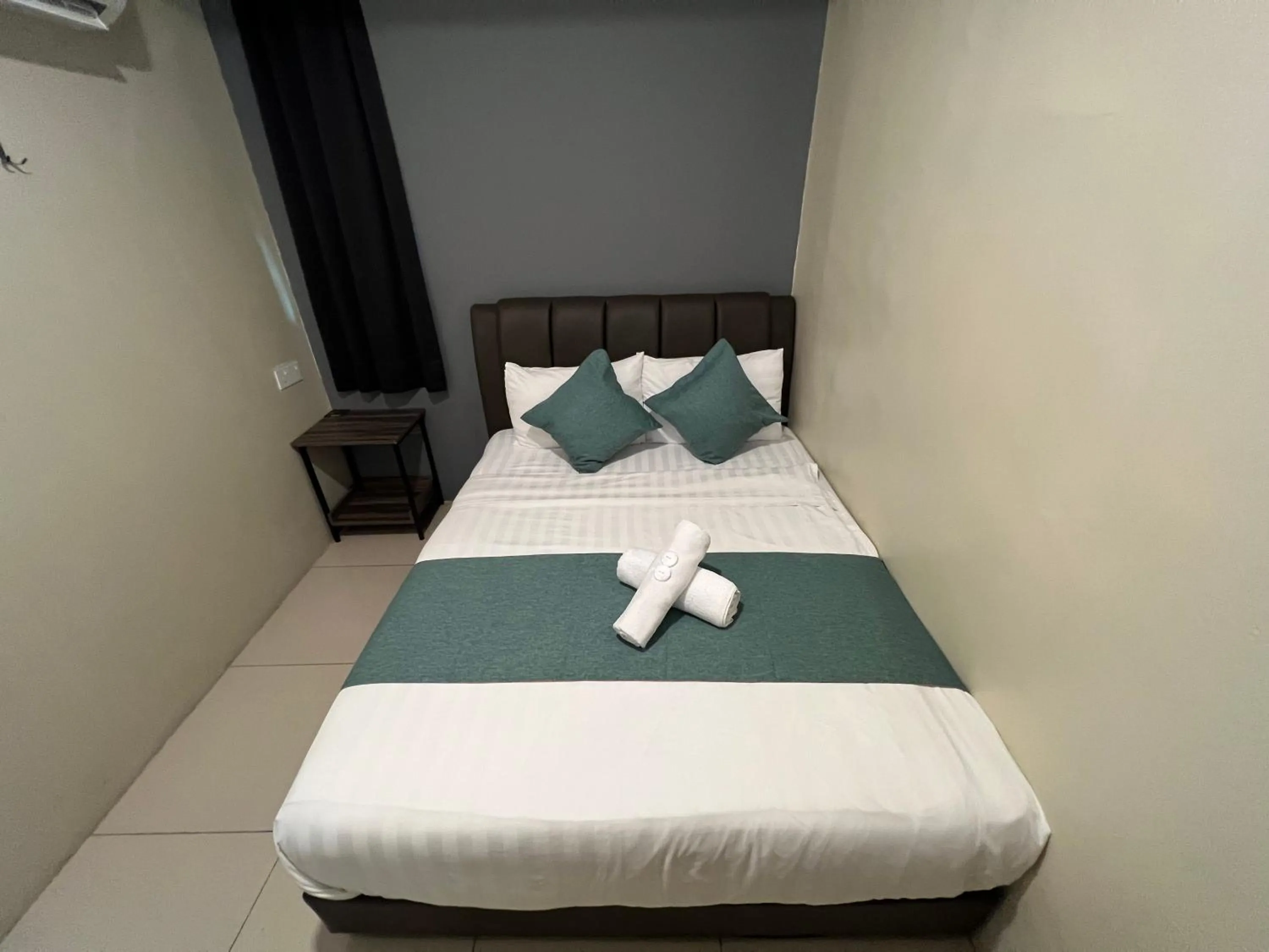 Bed in KUANTAN BESERAH BUDGET HOTEL