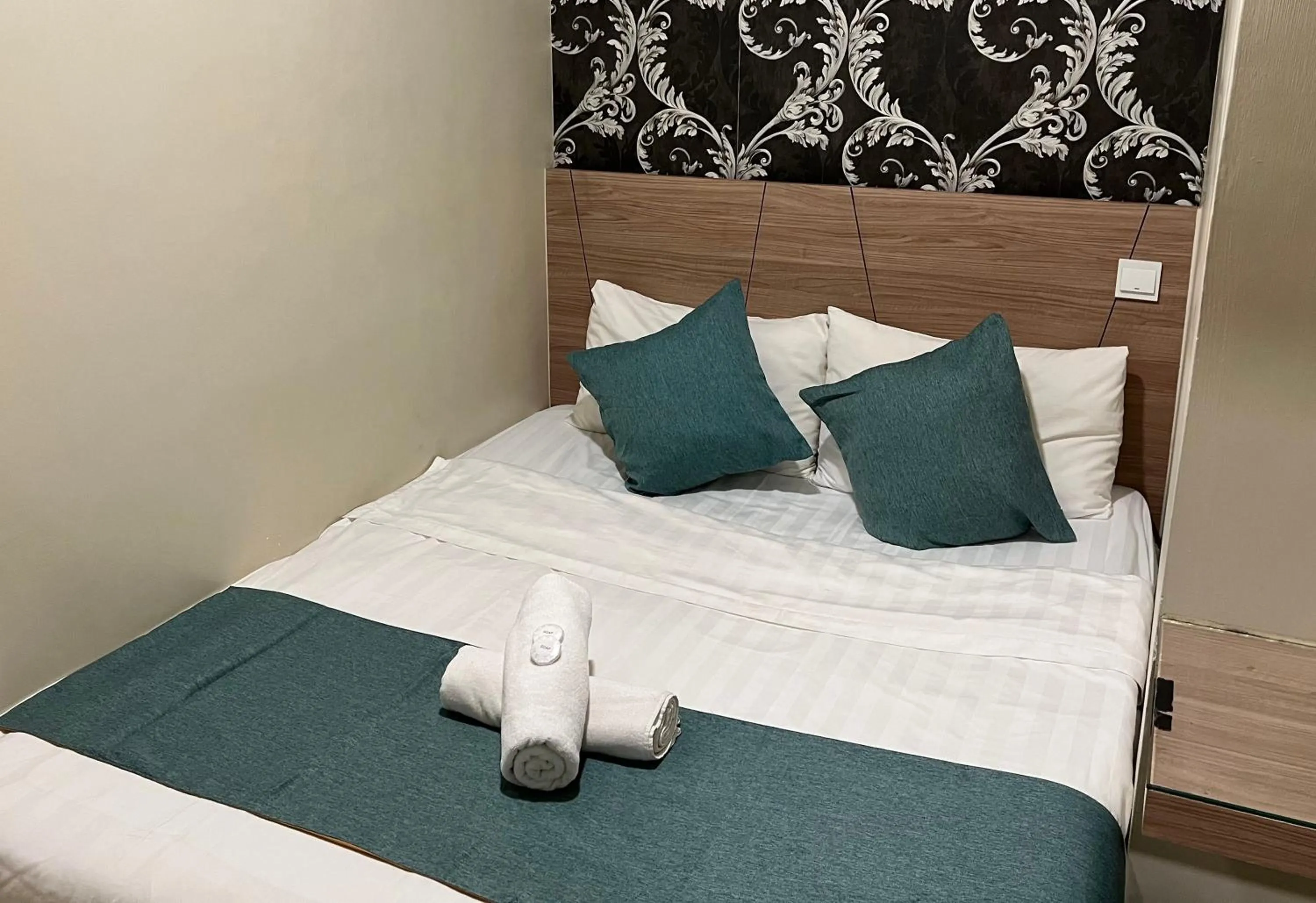 Bed in KUANTAN BESERAH BUDGET HOTEL