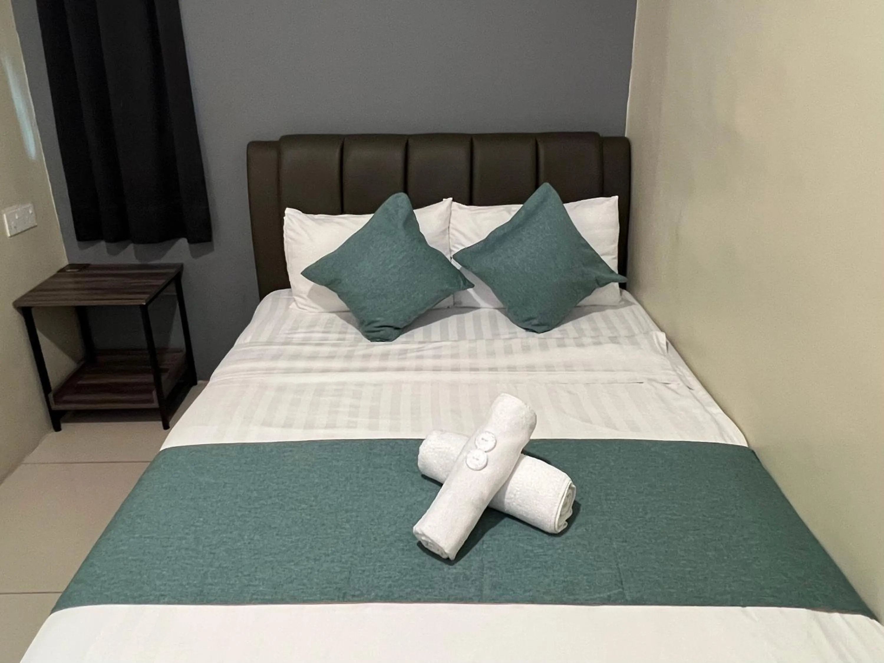 Bed in KUANTAN BESERAH BUDGET HOTEL