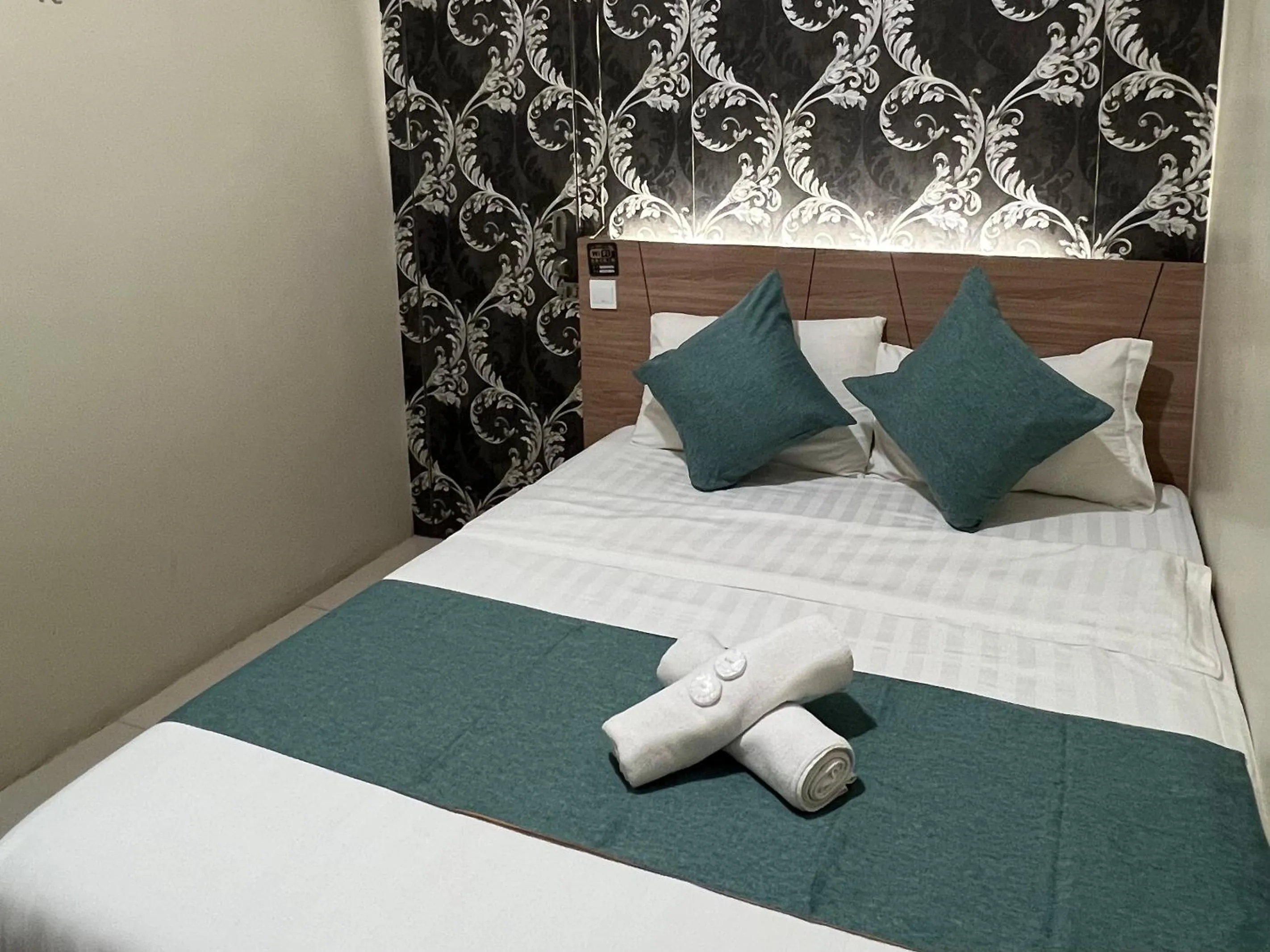 Bed in KUANTAN BESERAH BUDGET HOTEL