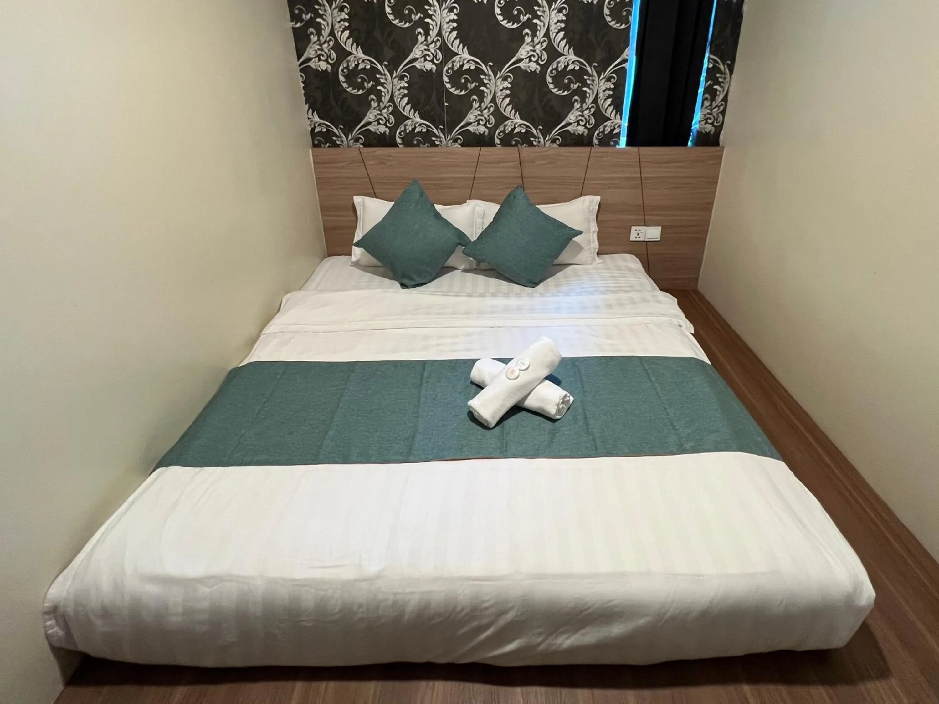 Bed in KUANTAN BESERAH BUDGET HOTEL