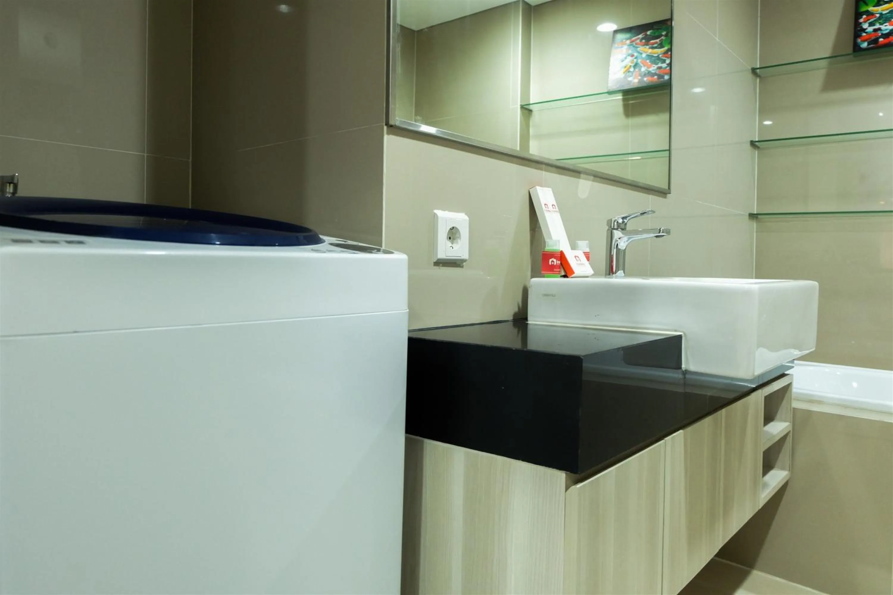 Studio Room Azalea Suites Apartment By Travelio