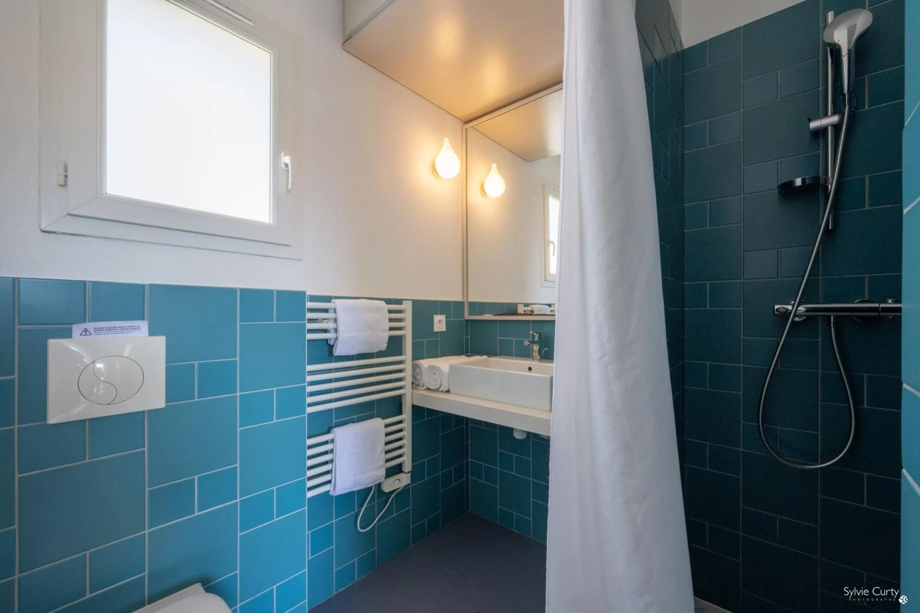 Shower in Côté Océan Resort