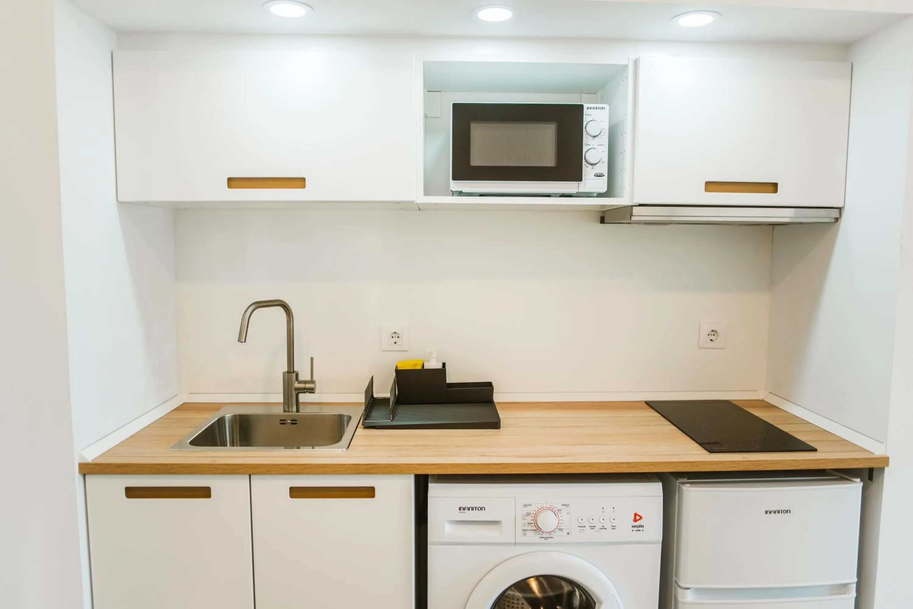 Kitchen or kitchenette in Apartamentos ZHR