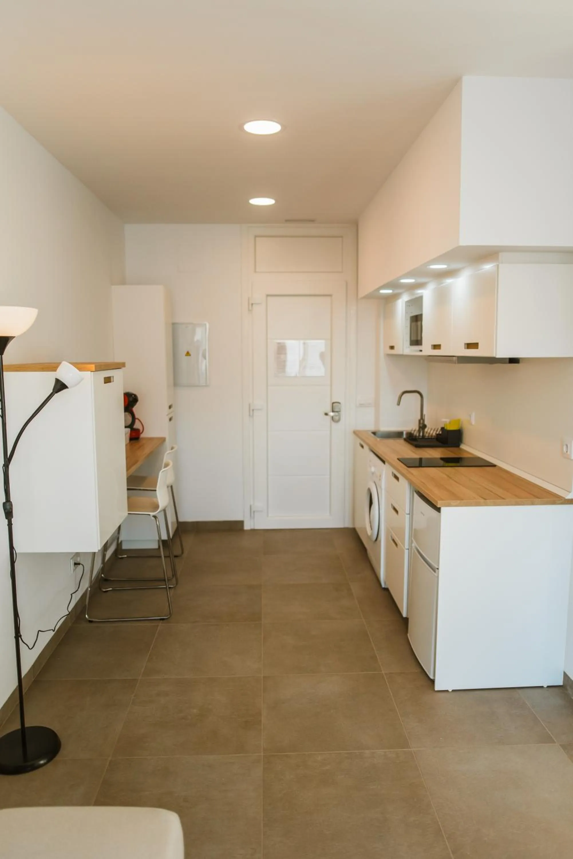 Kitchen or kitchenette in Apartamentos ZHR
