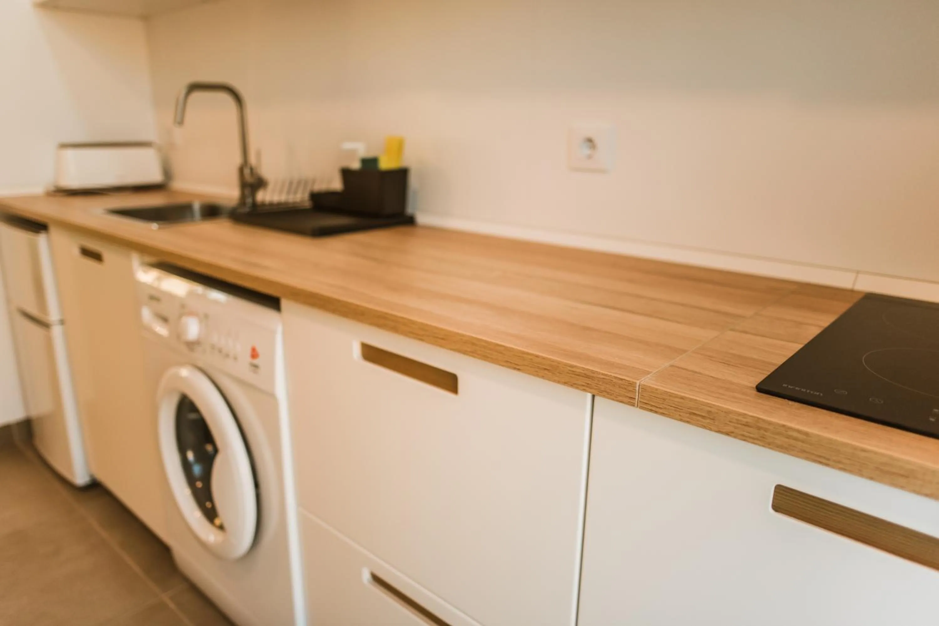 Kitchen or kitchenette in Apartamentos ZHR