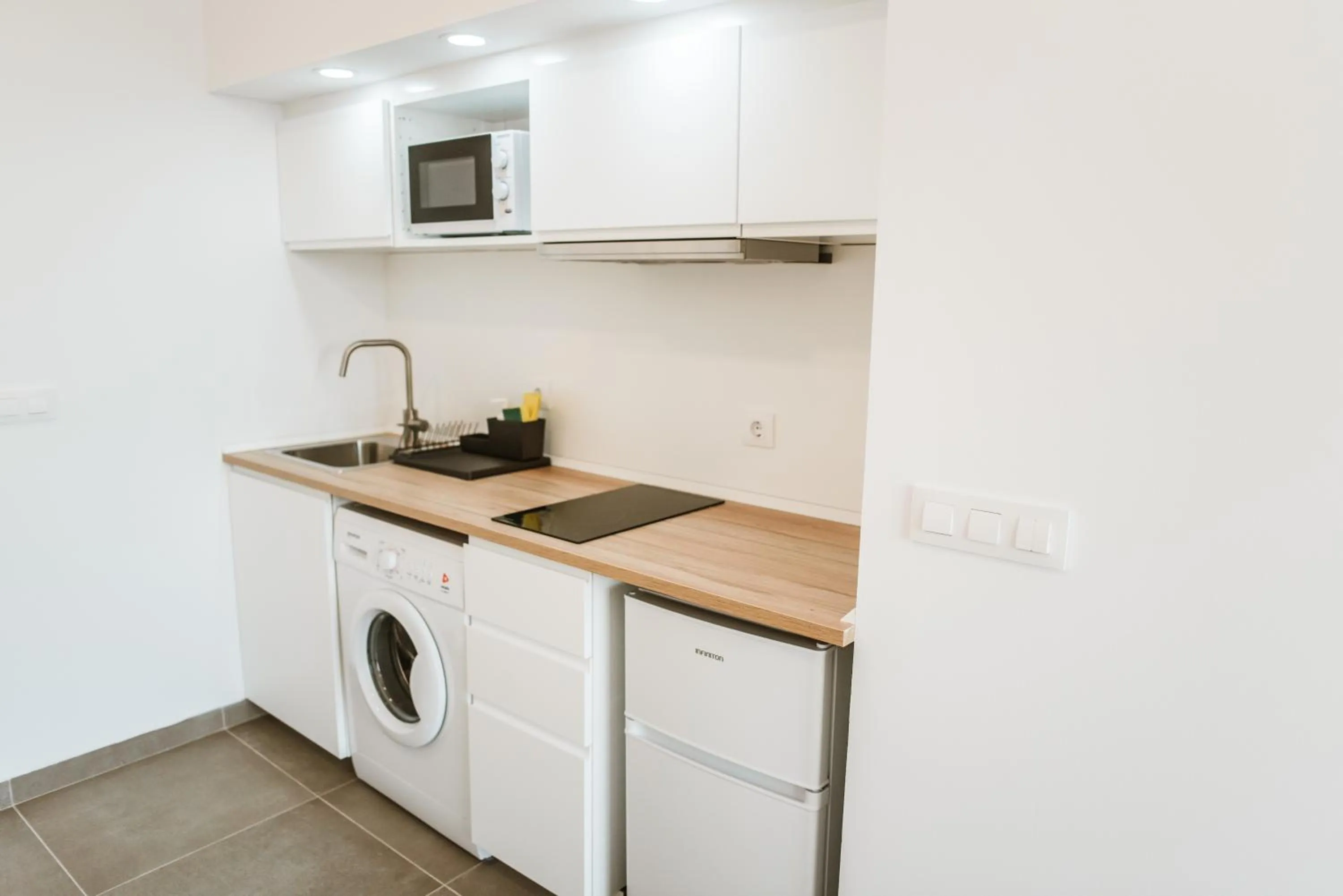 Kitchen or kitchenette in Apartamentos ZHR
