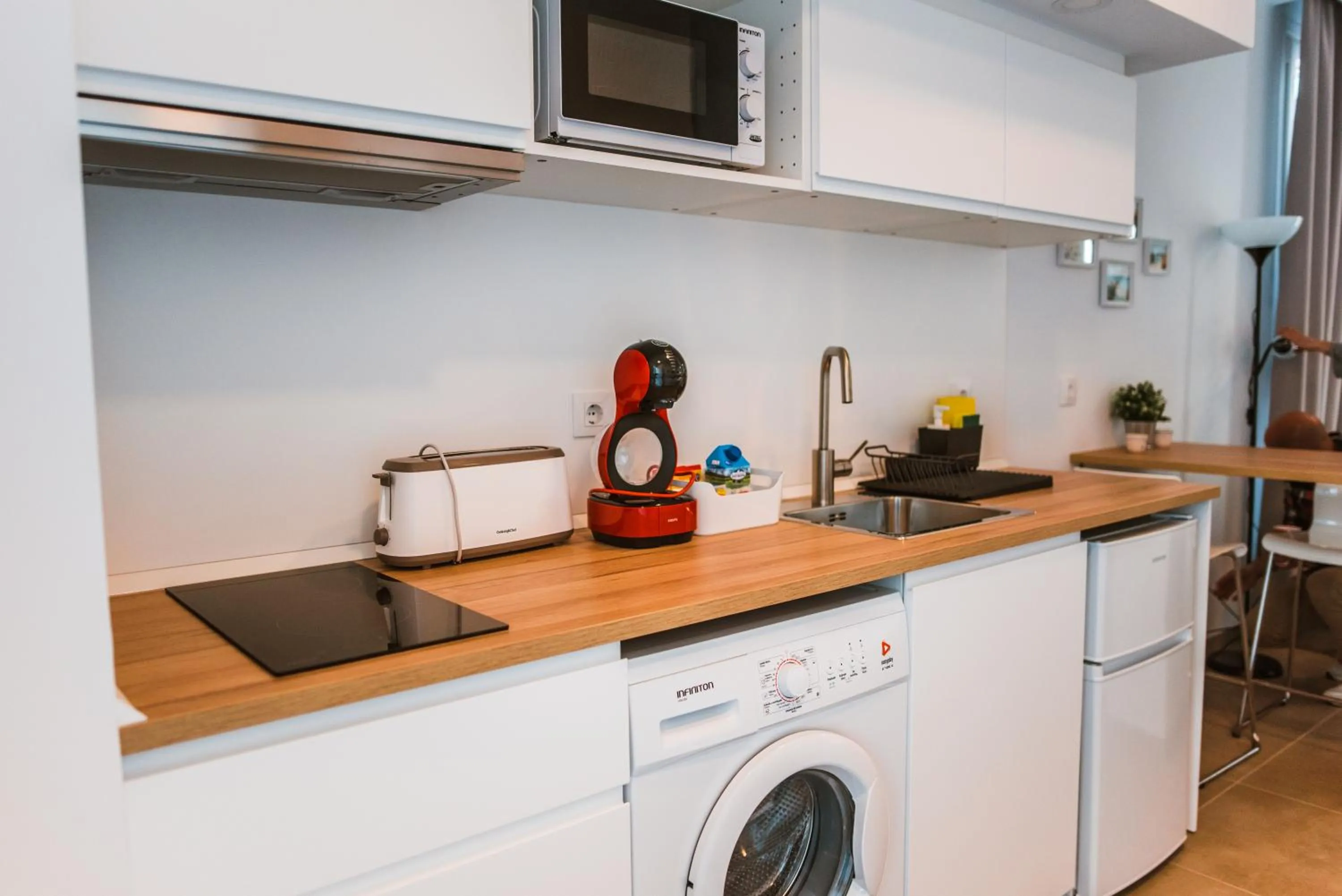Kitchen or kitchenette in Apartamentos ZHR