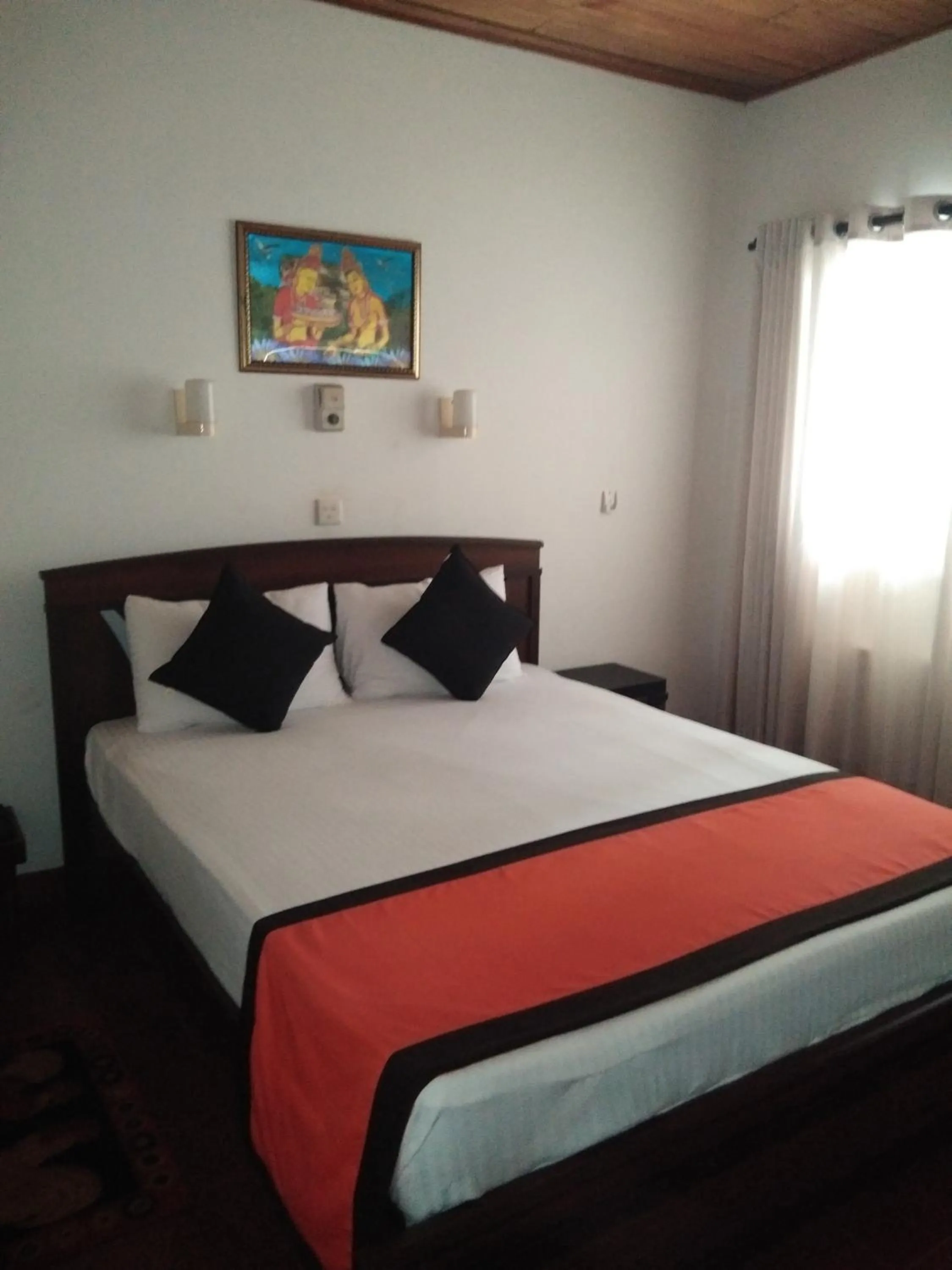 Bed in New SeaSide Inn Hikkaduwa