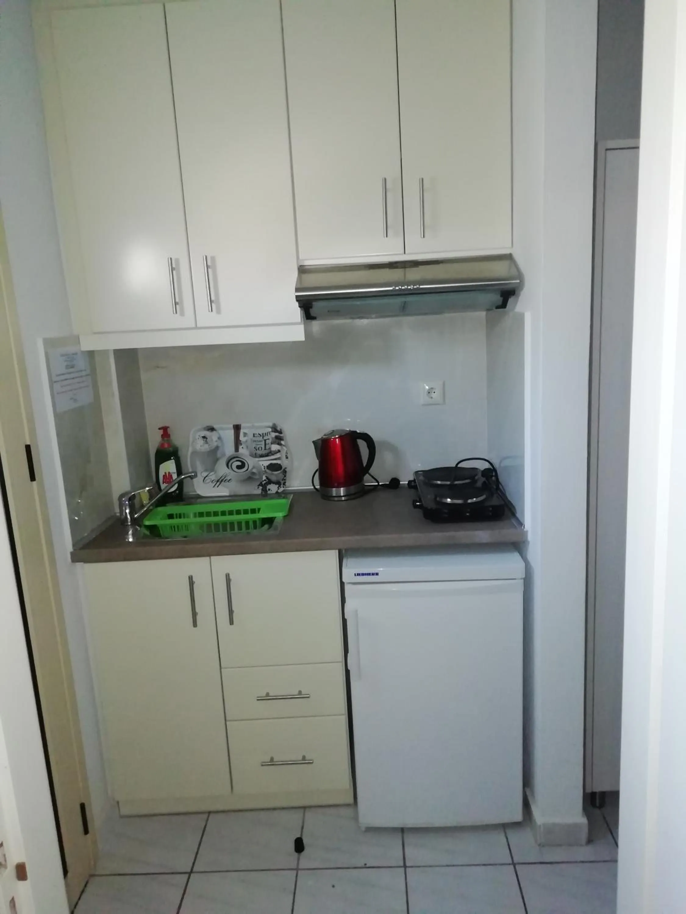 Kitchen or kitchenette in Studios Magda