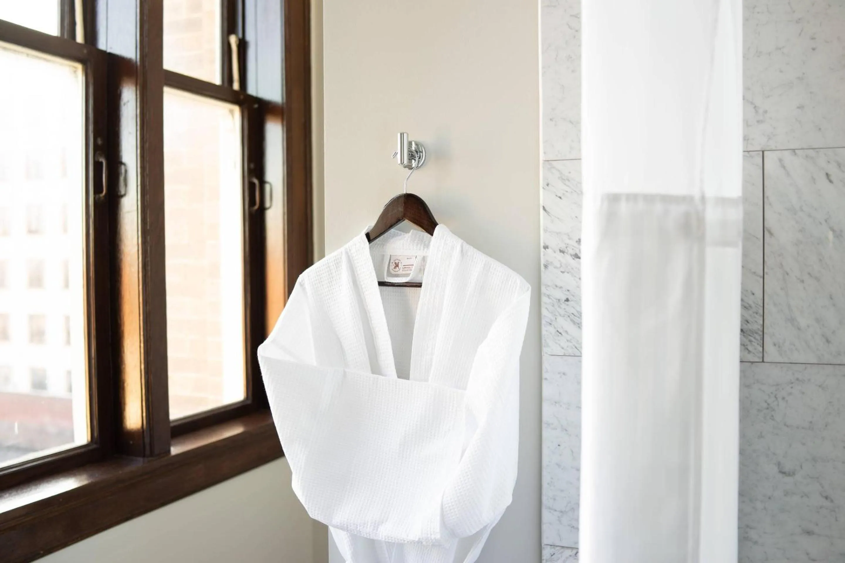 Bedroom in The Esquire Hotel Downtown Gastonia, an Ascend Collection Hotel