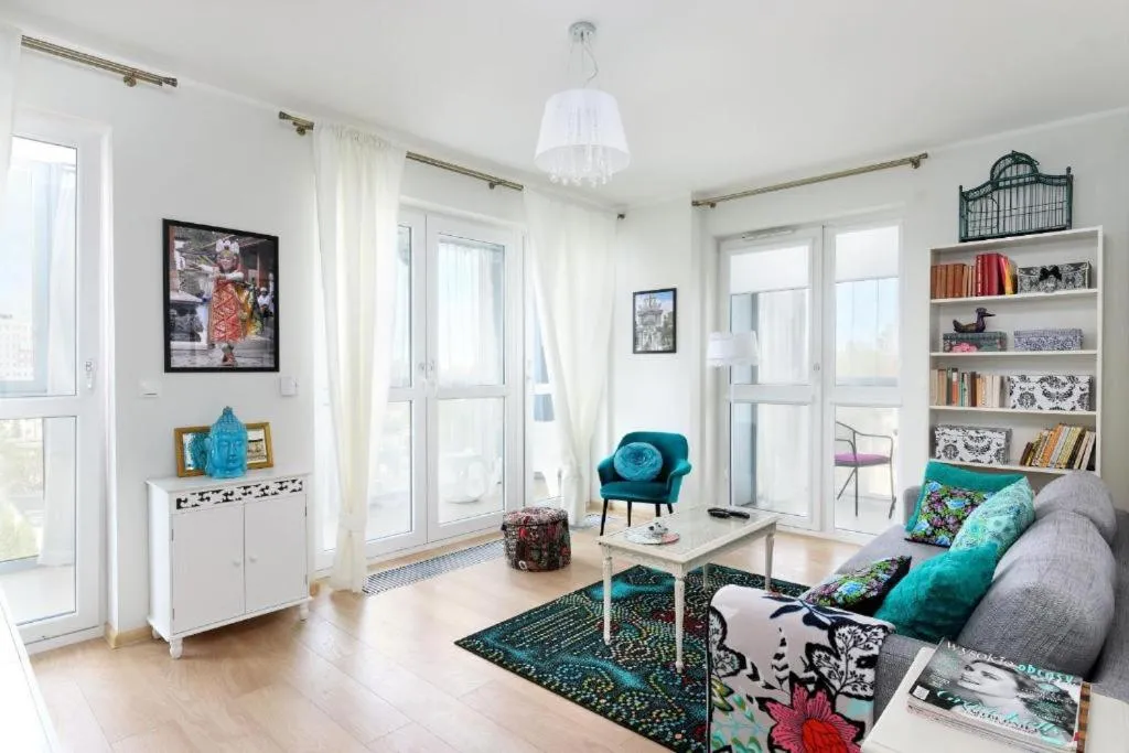 Seating Area in NotaBene Wola Apartment