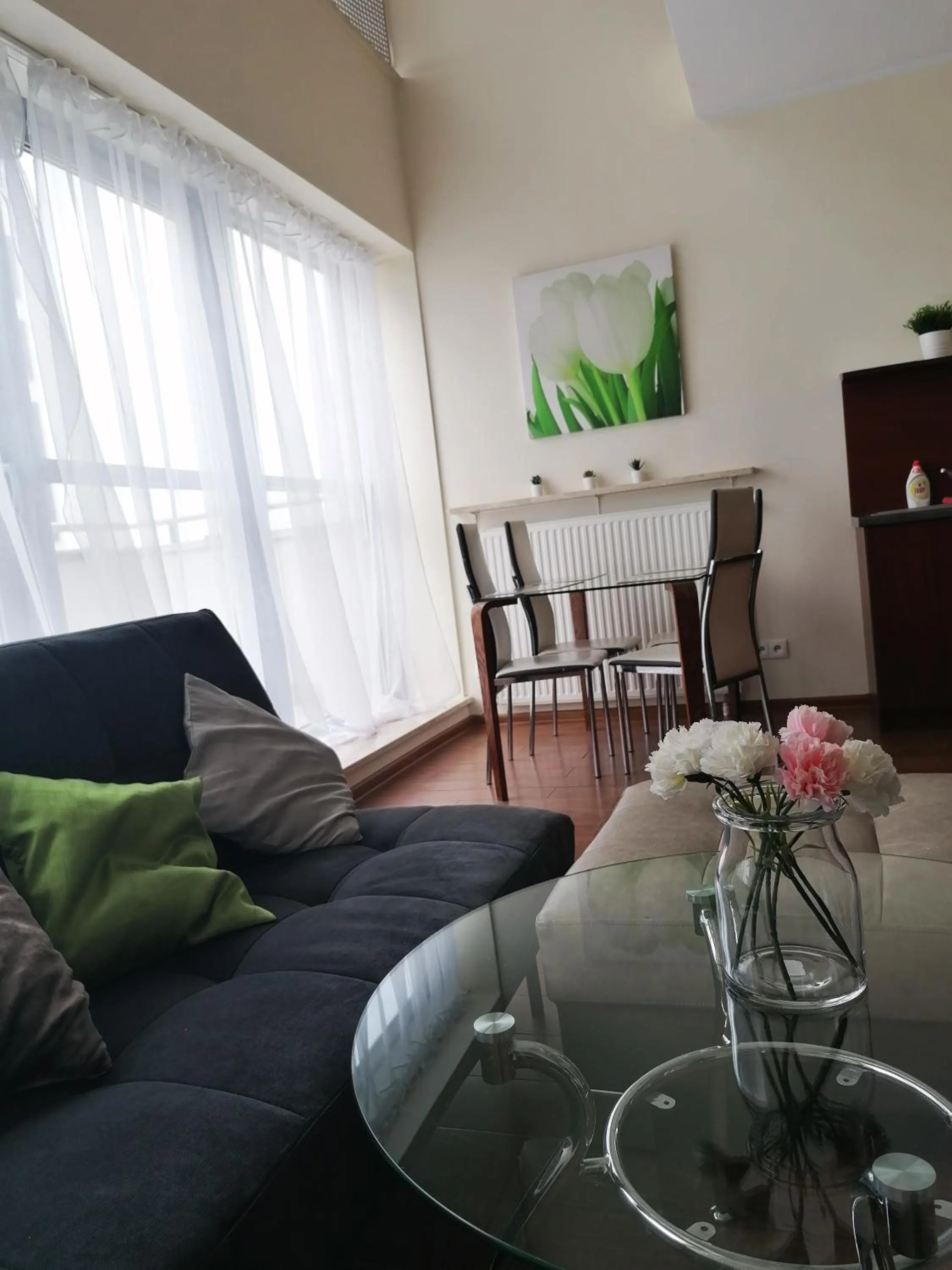 Seating Area in NotaBene Wola Apartment