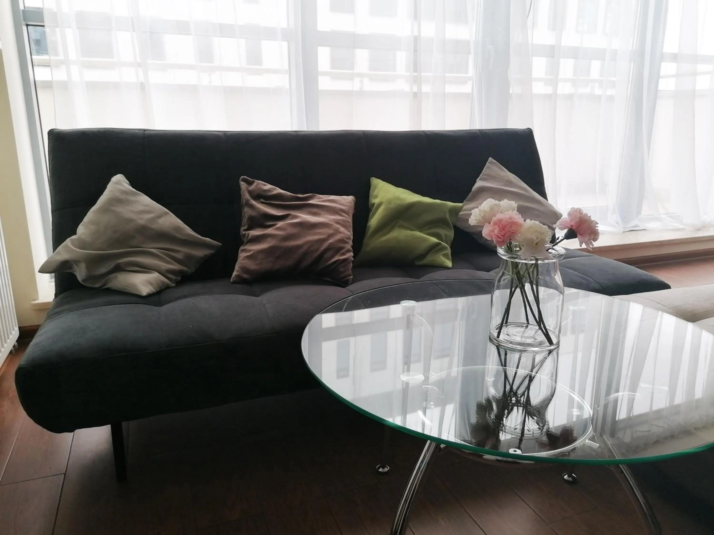 Seating Area in NotaBene Wola Apartment