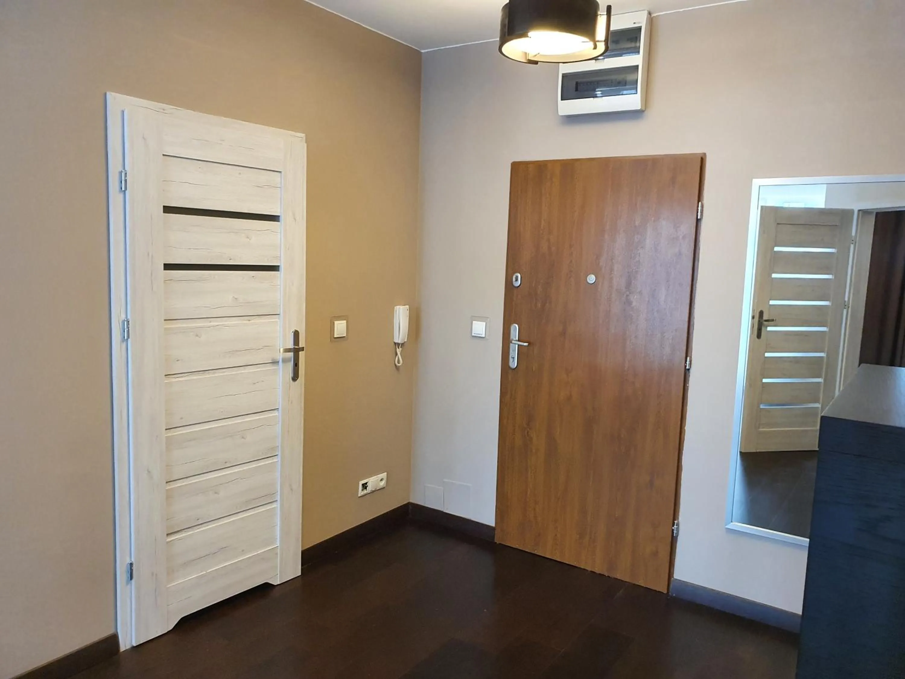 Photo of the whole room, TV/Entertainment Center in NotaBene Wola Apartment