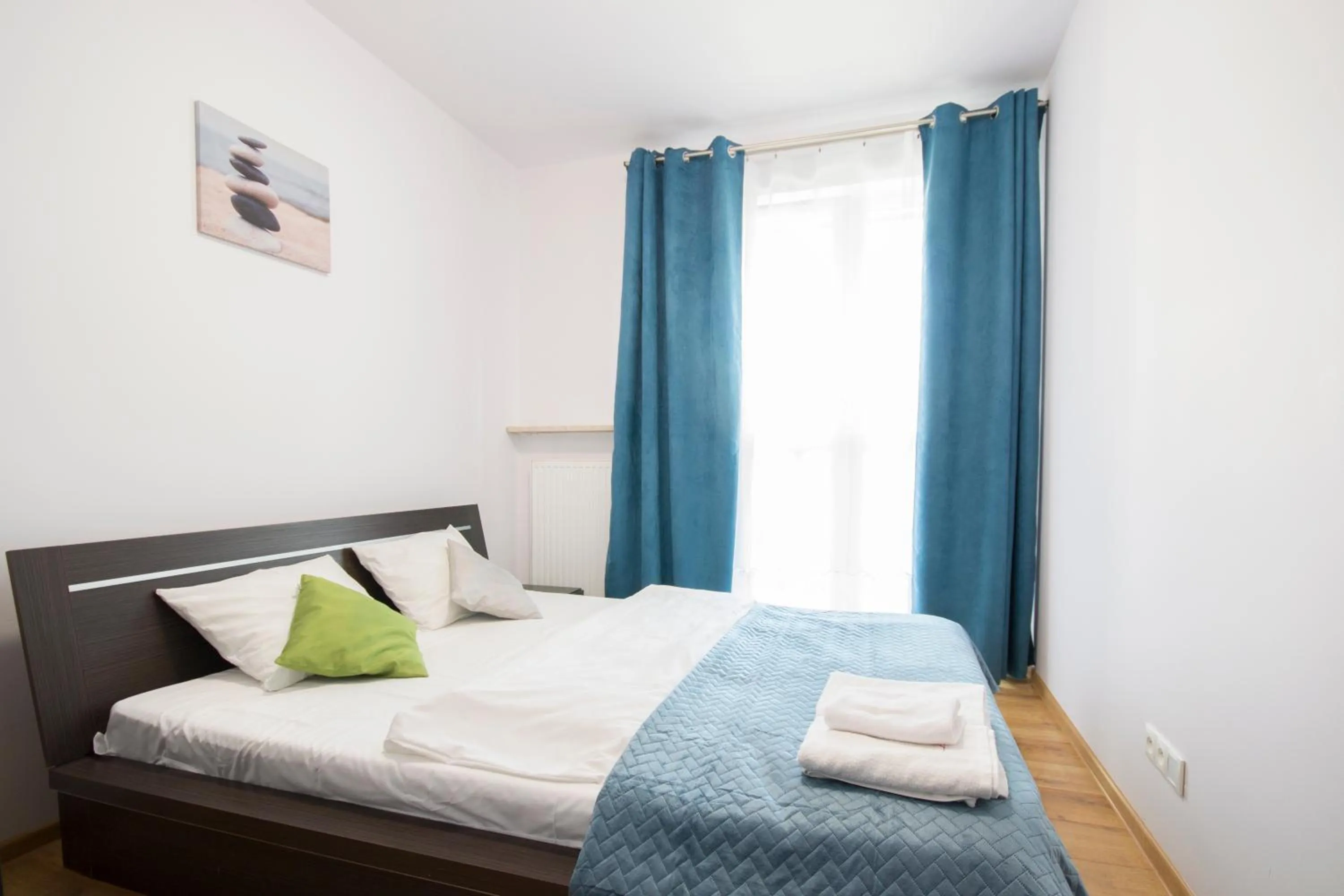 Bed in NotaBene Wola Apartment